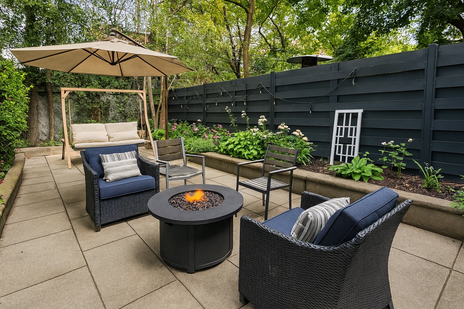 a view of a backyard with sitting area and furniture