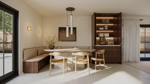 a living room with furniture a window and a flat screen tv