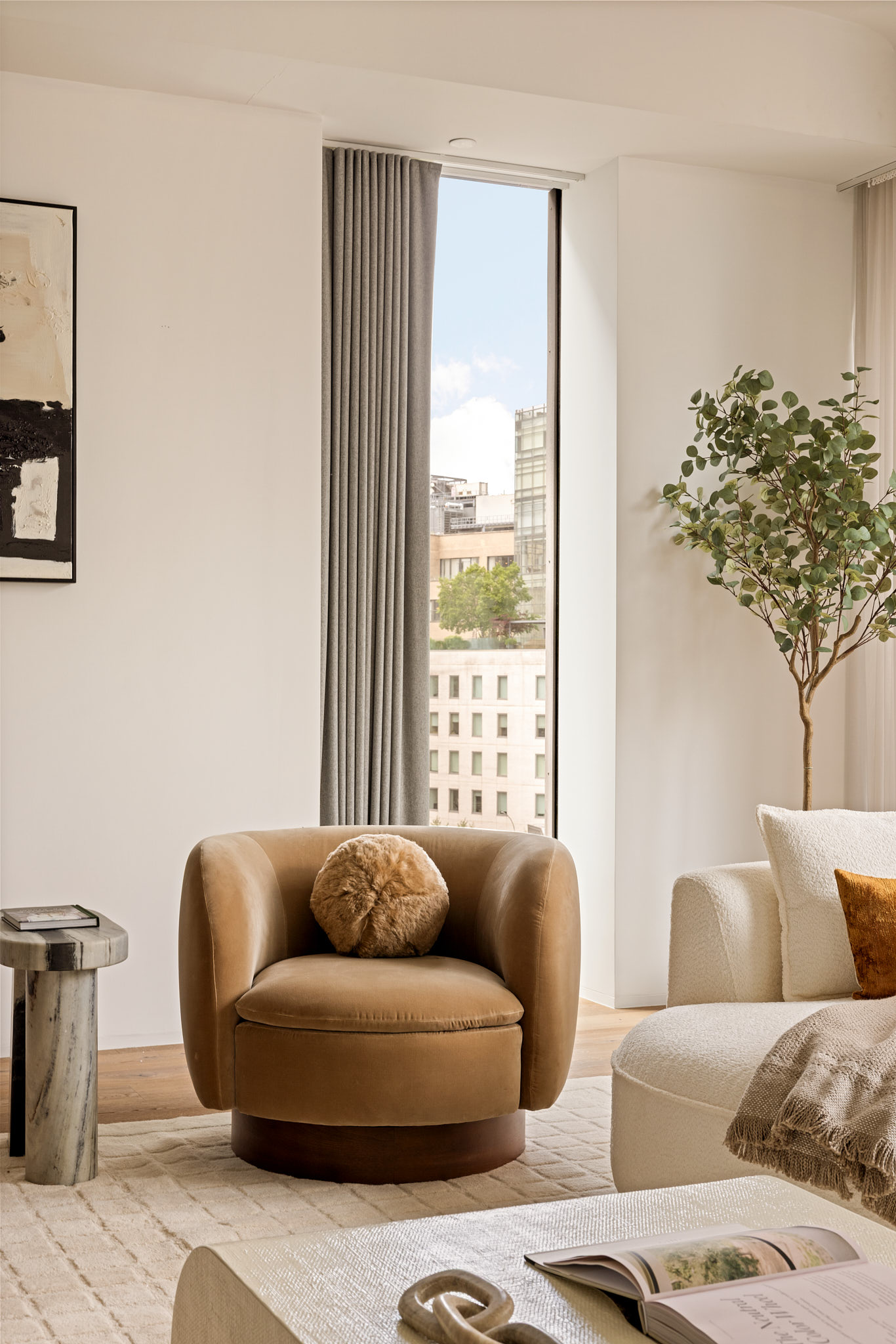 325 West Broadway, Unit 7B Manhattan, NY 10013 - Photo 3 of 21 a living room with furniture and a large window