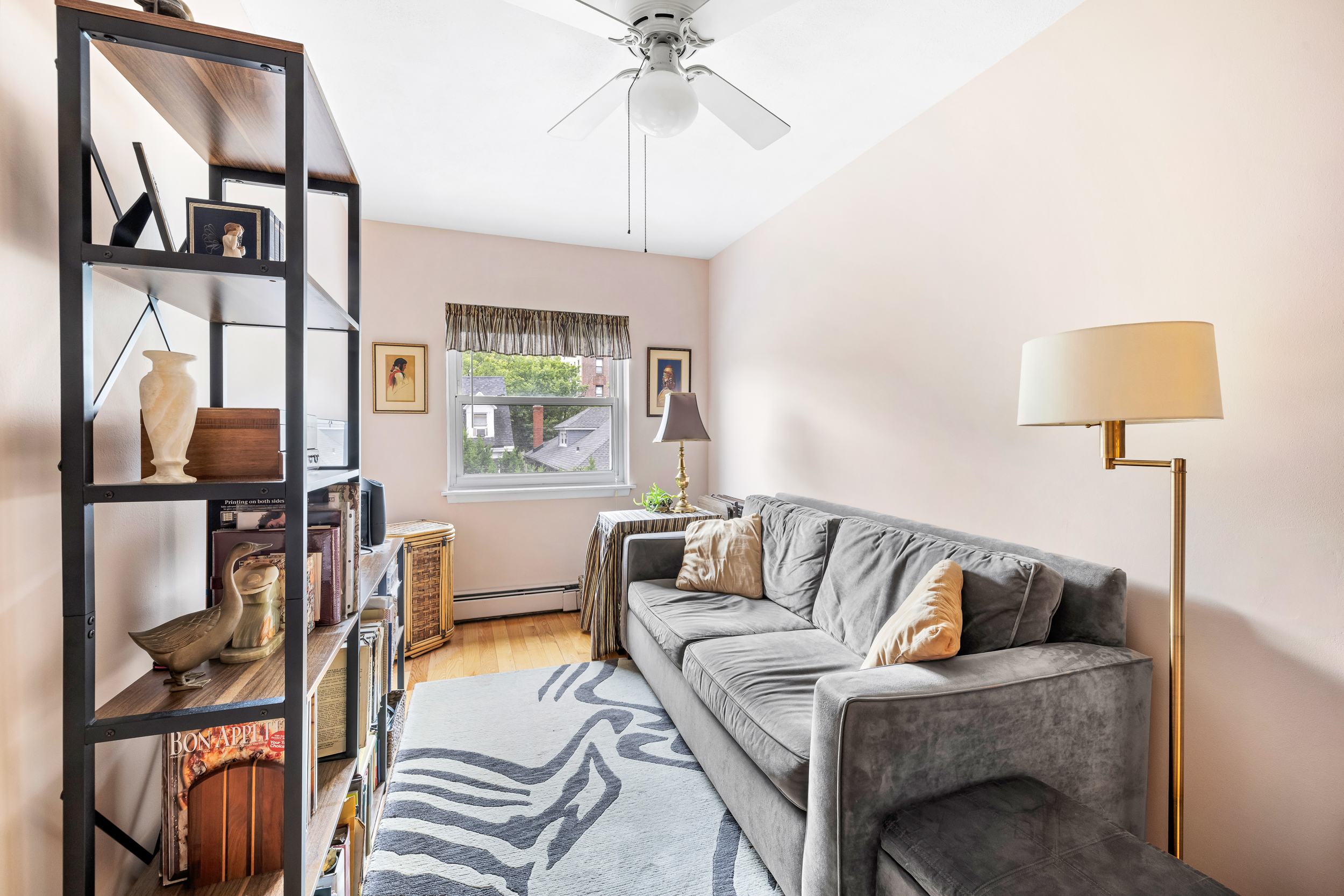 436 78th Street, Unit 5 Brooklyn, NY 11209 - Photo 8 of 10 a living room with furniture and a window