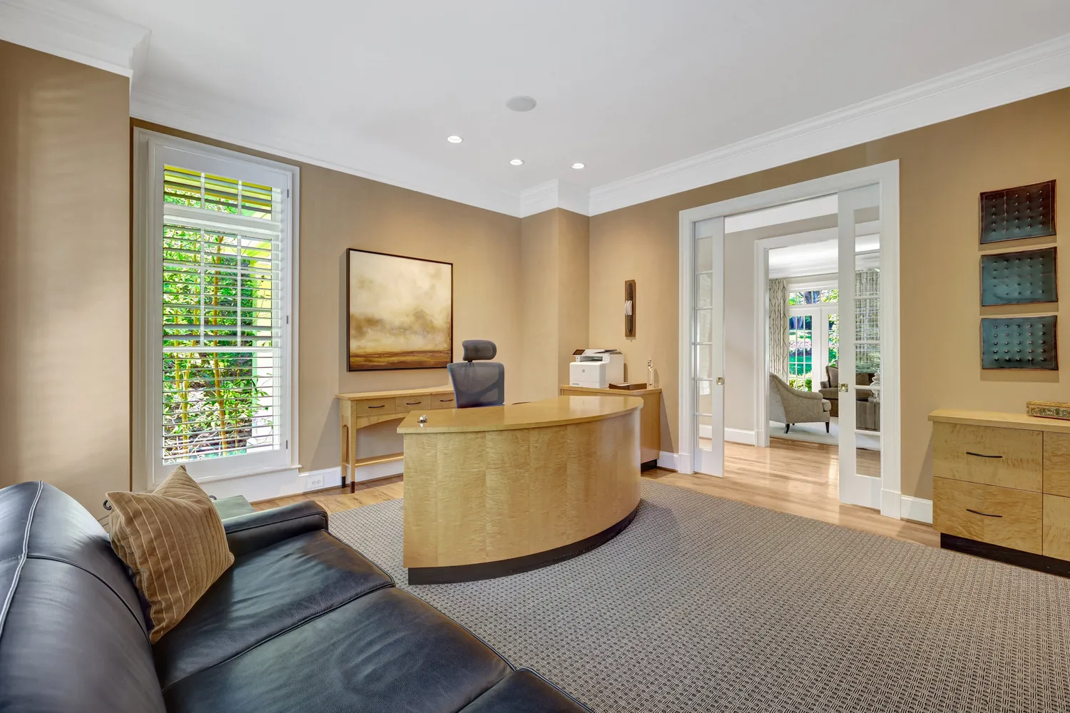 a dining room with furniture and window
