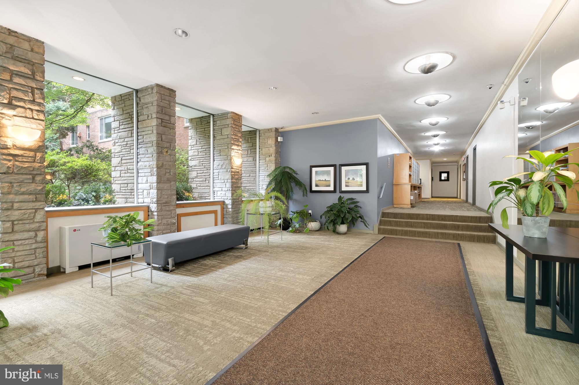4100 W Street Northwest, Unit 314 Washington, DC 20007 - Photo 3 of 28 a lobby with furniture and a large window