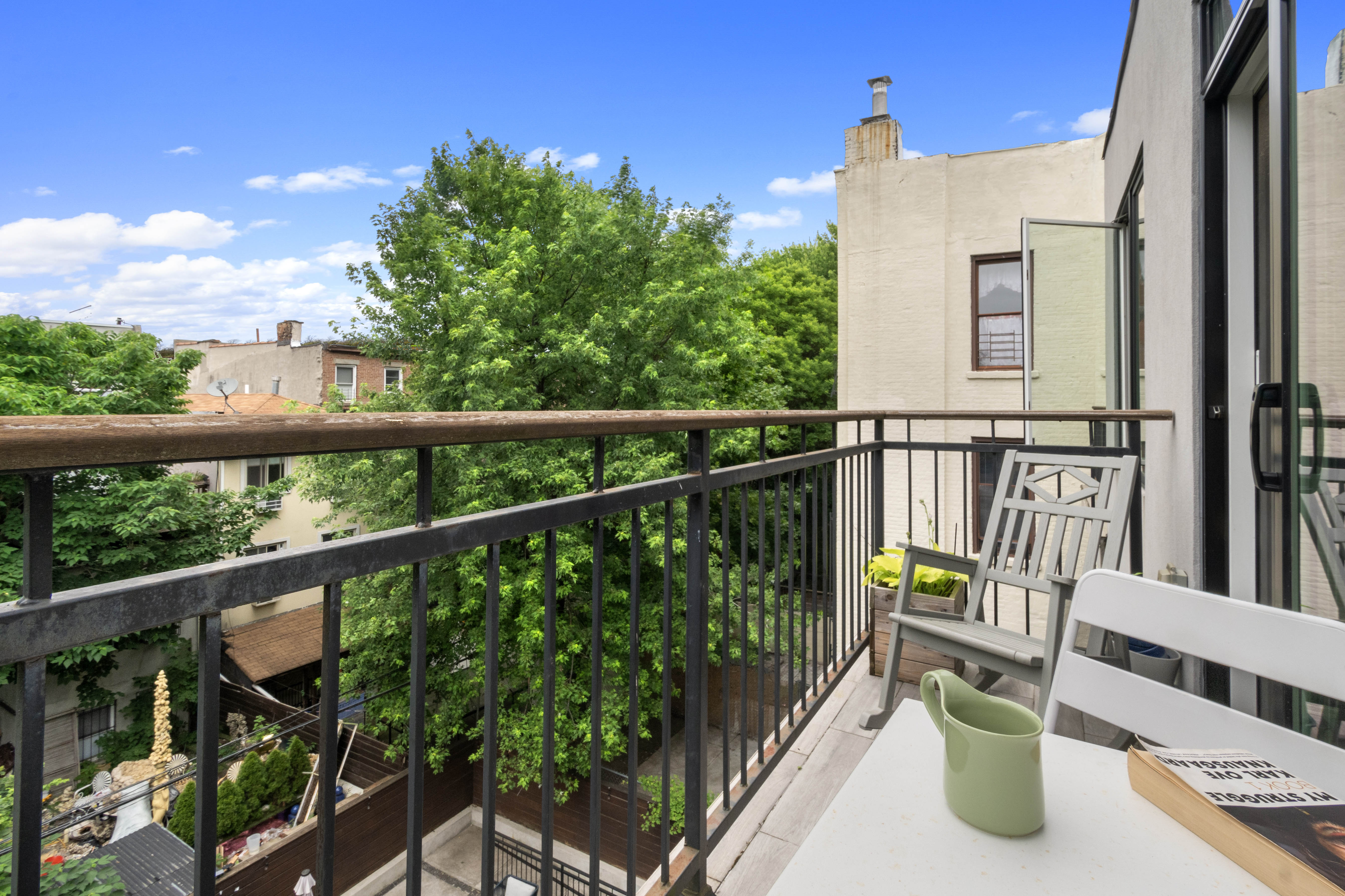 203 Quincy Street, Unit 4B Brooklyn, NY 11216 - Photo 10 of 11 a view of balcony with furniture