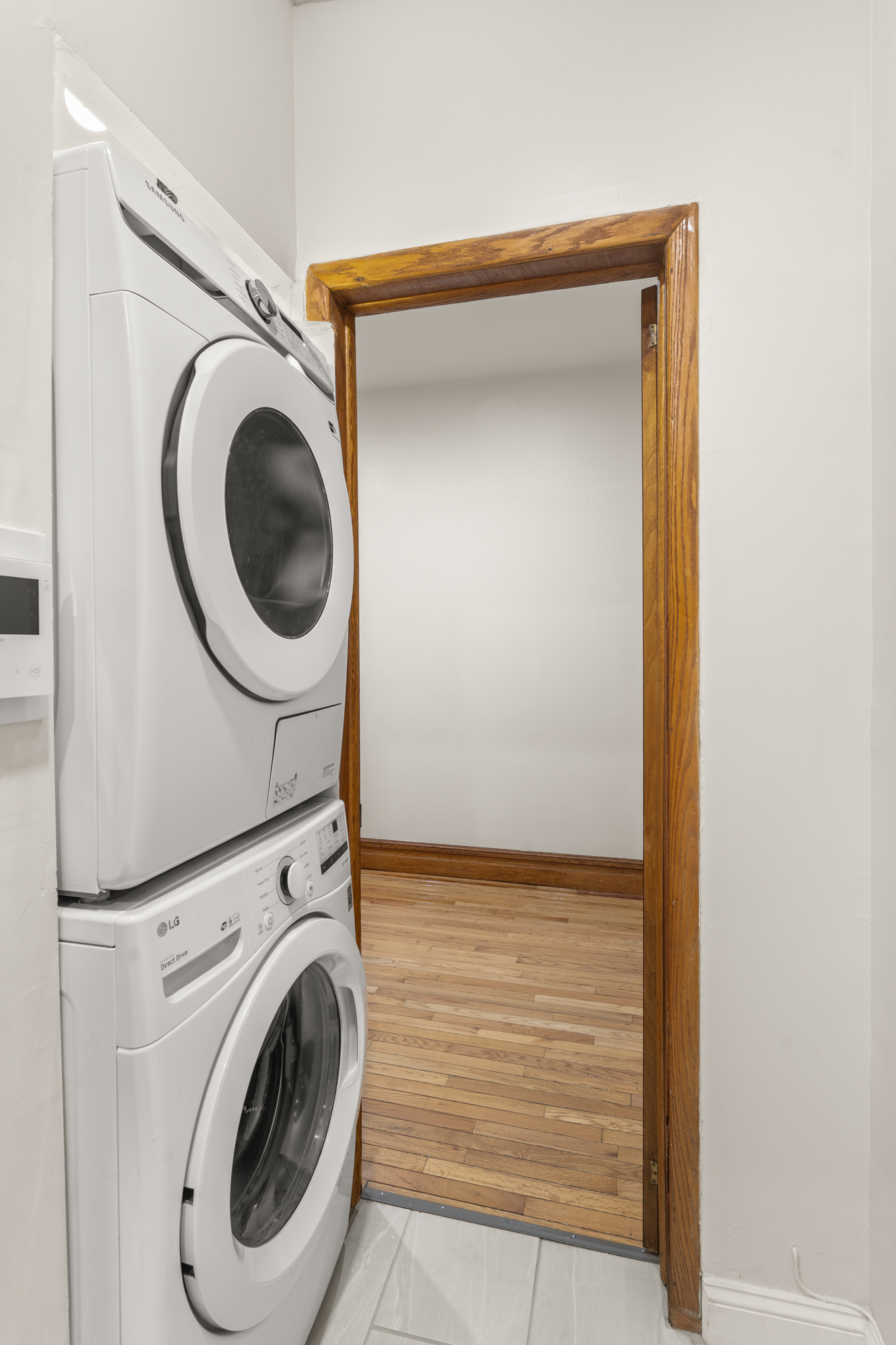 527 West 143rd Street, Unit 31 Manhattan, NY 10031 - Photo 10 of 29 a utility room with dryer and washer