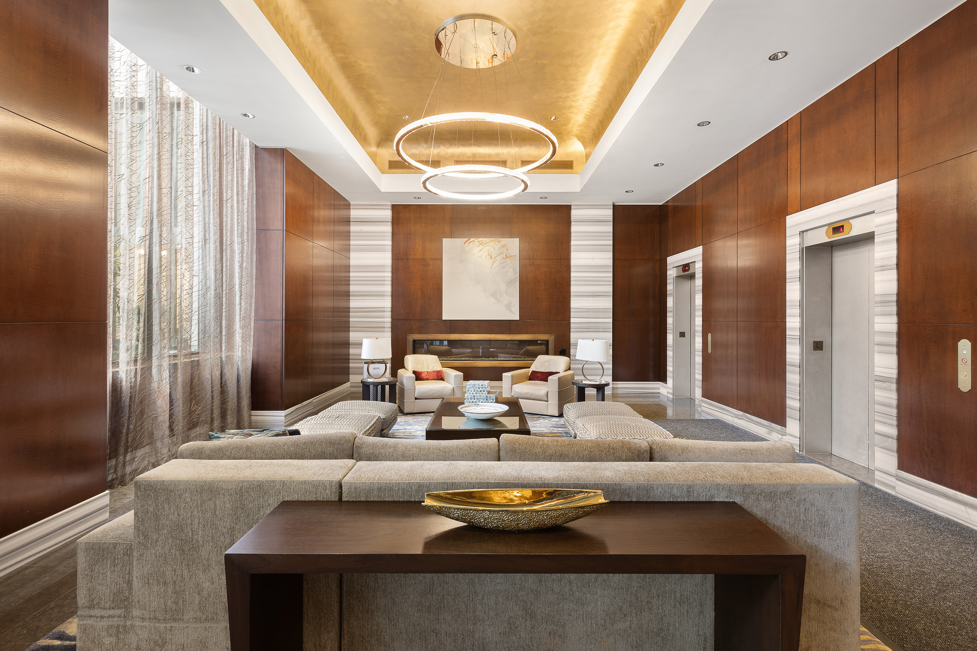 422 East 72nd Street, Unit 27C Manhattan, NY 10021 - Photo 23 of 25 a living room with furniture and a large window