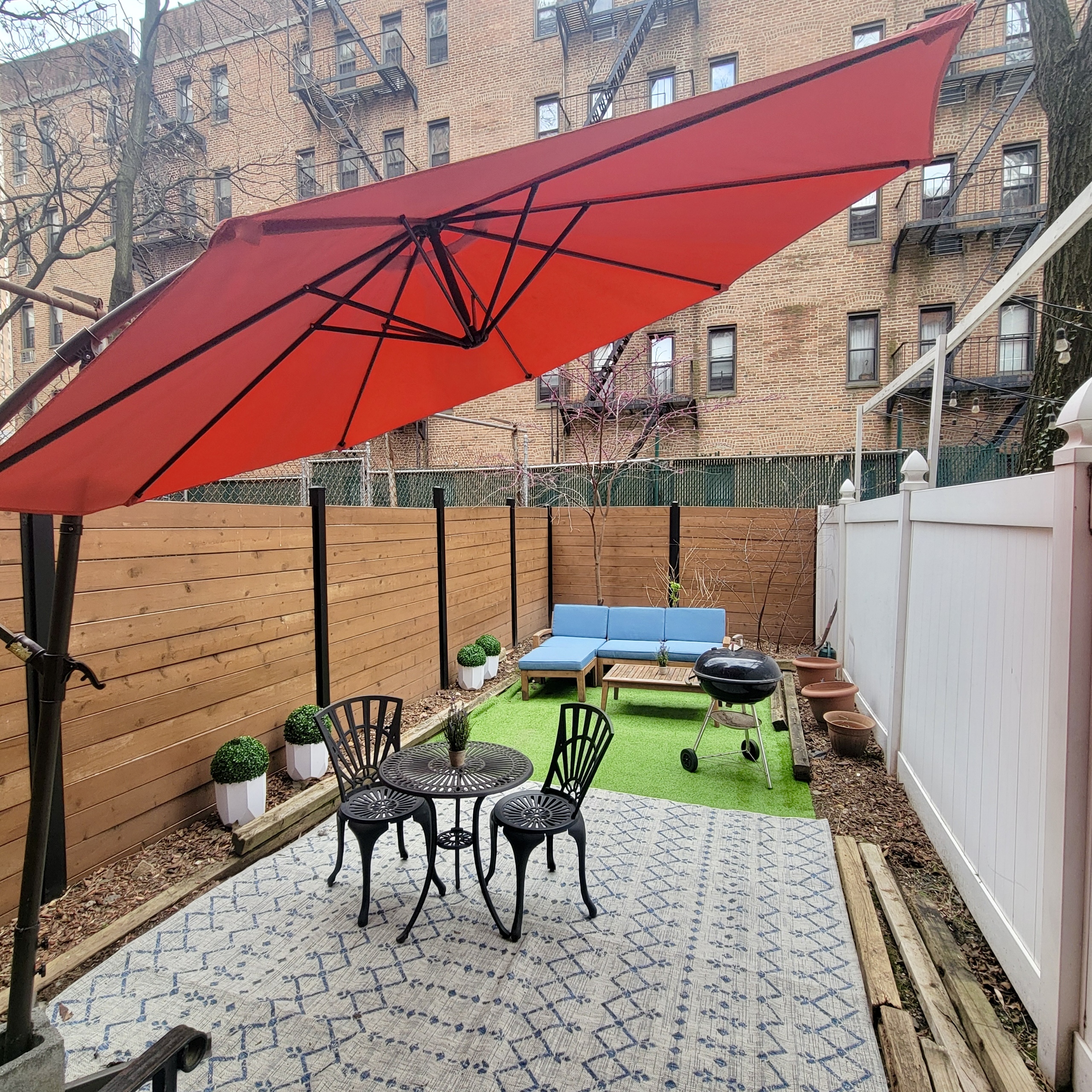 a view of yard with patio