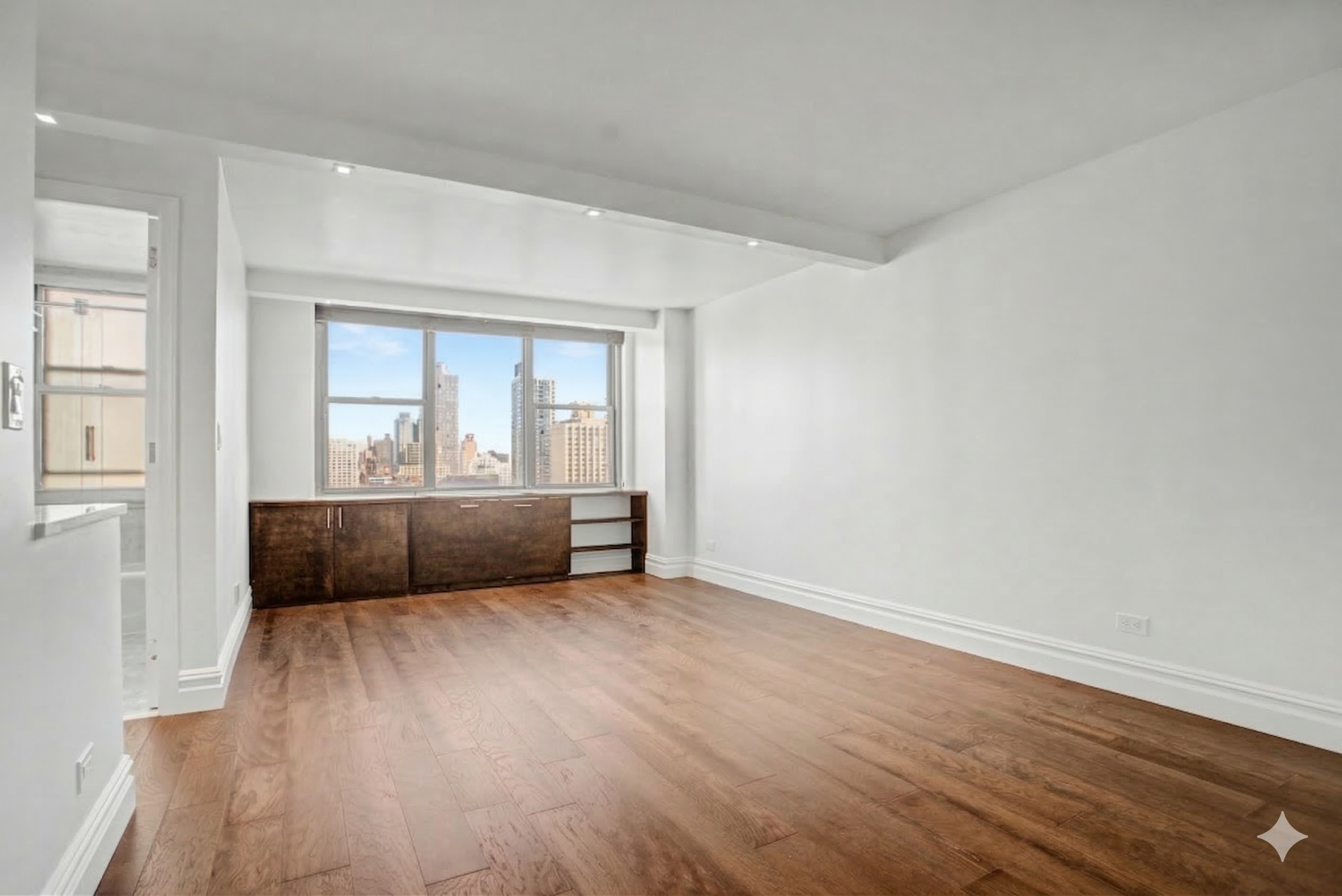 301 East 79th Street, Unit 17F Manhattan, NY 10075 - Photo 3 of 15 wooden floor in a room