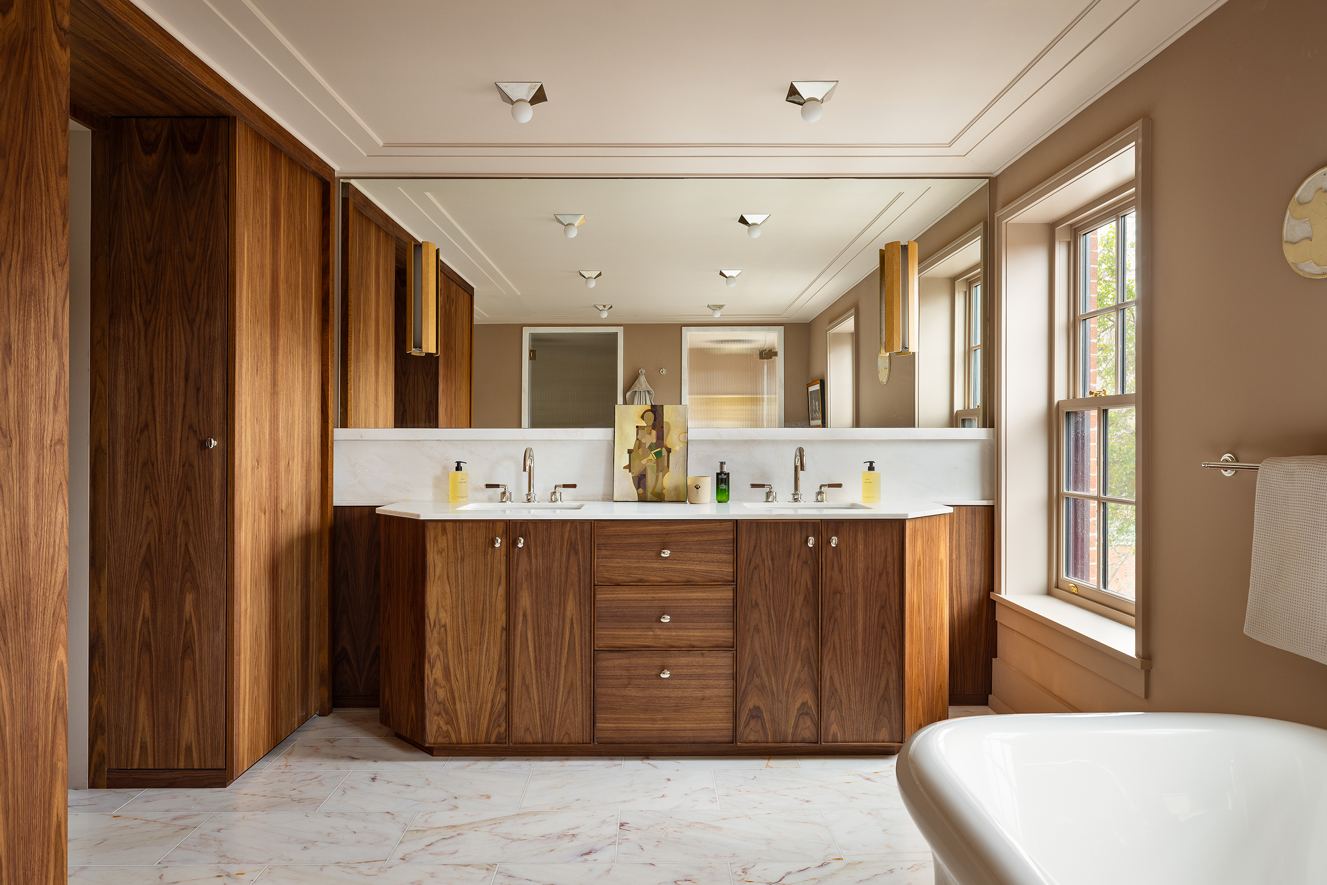 487 Henry Street Brooklyn, NY 11231 - Photo 22 of 37 a spacious bathroom with a double vanity sink and a large mirror
