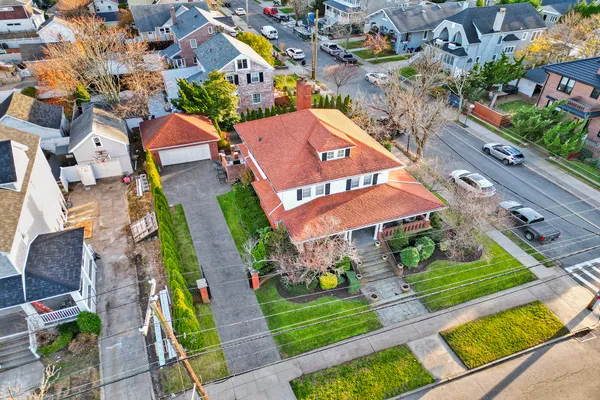 an aerial view of a houses with outdoor space