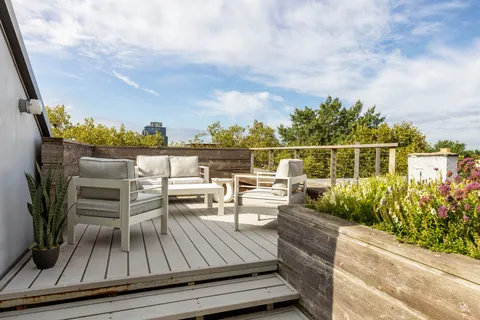a black and white photo of a living room