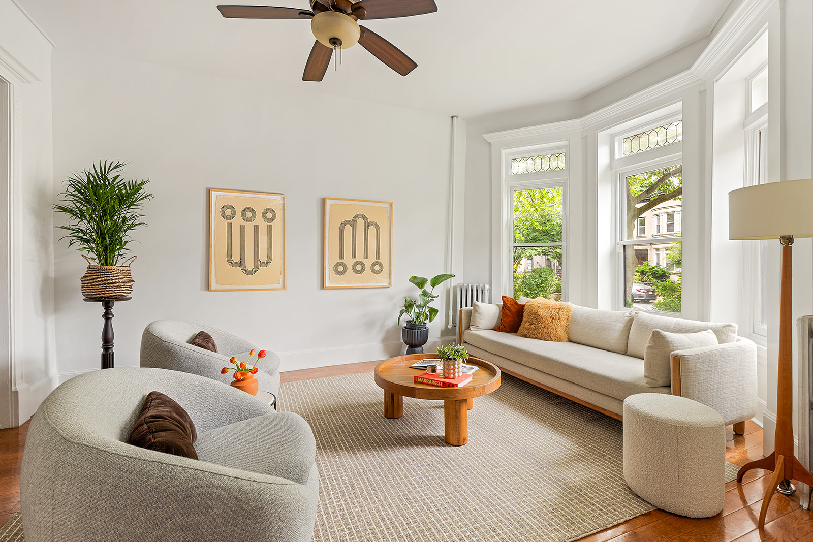 203 Lefferts Avenue Brooklyn, NY 11225 - Photo 3 of 12 a living room with furniture and a large window