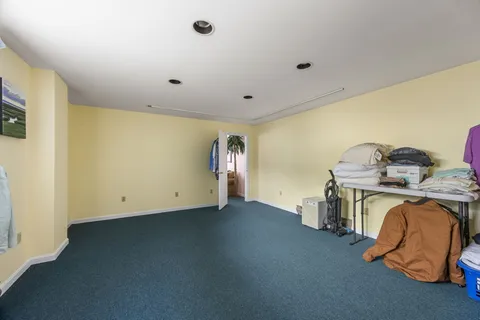 a view of a room with furniture and toys