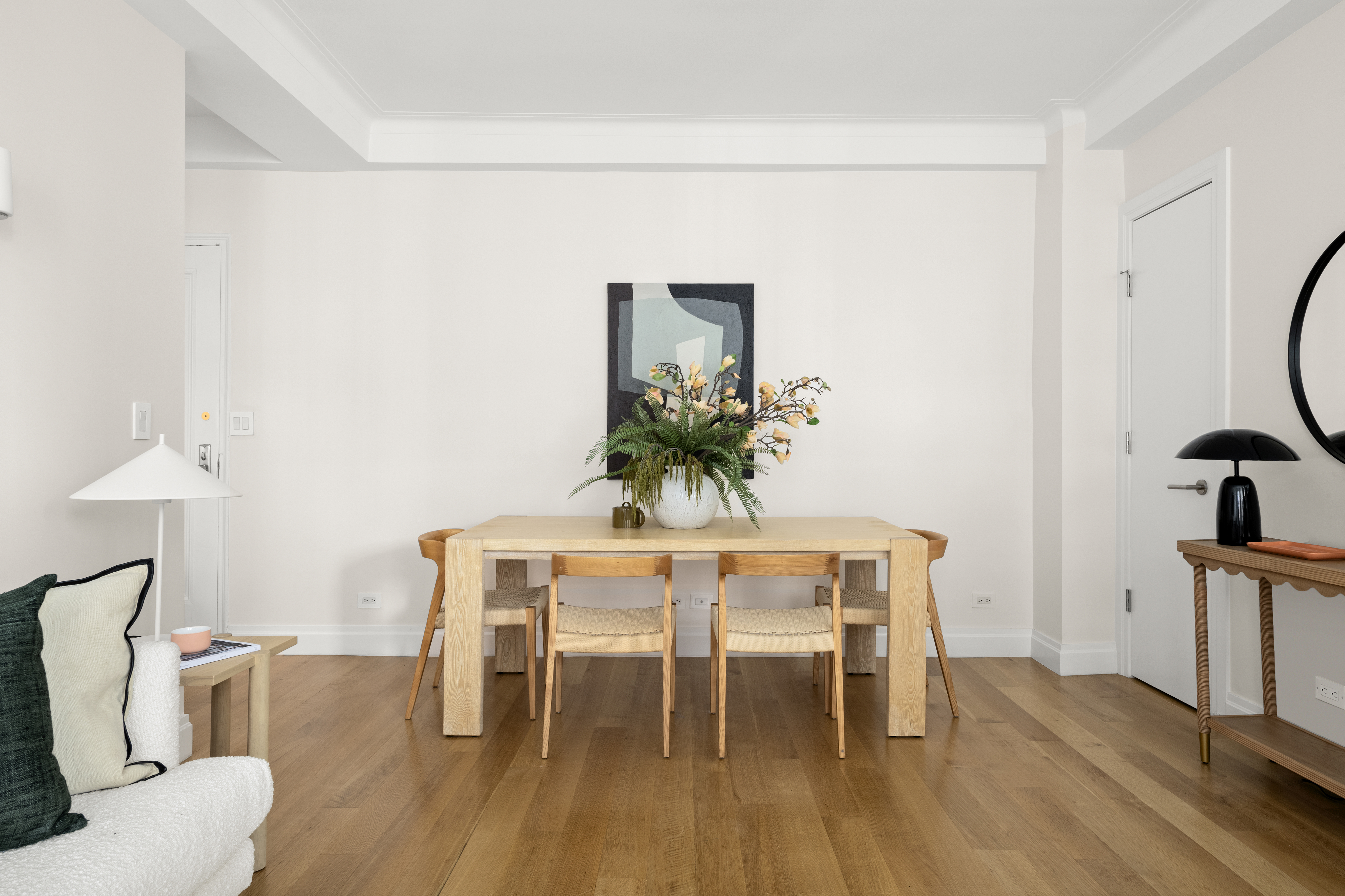 41 5th Avenue, Unit 8CN Manhattan, NY 10003 - Photo 6 of 11 a dining room with furniture and wooden floor