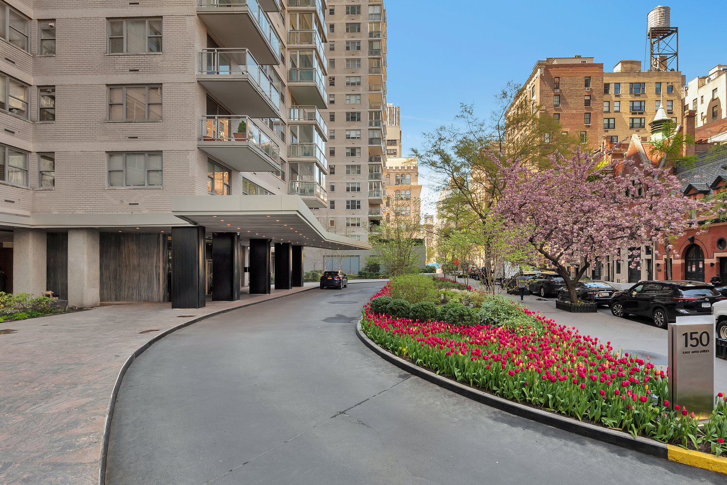 150 East 69th Street, Unit 8J Manhattan, NY 10021 - Photo 12 of 13 a front view of a multi story building