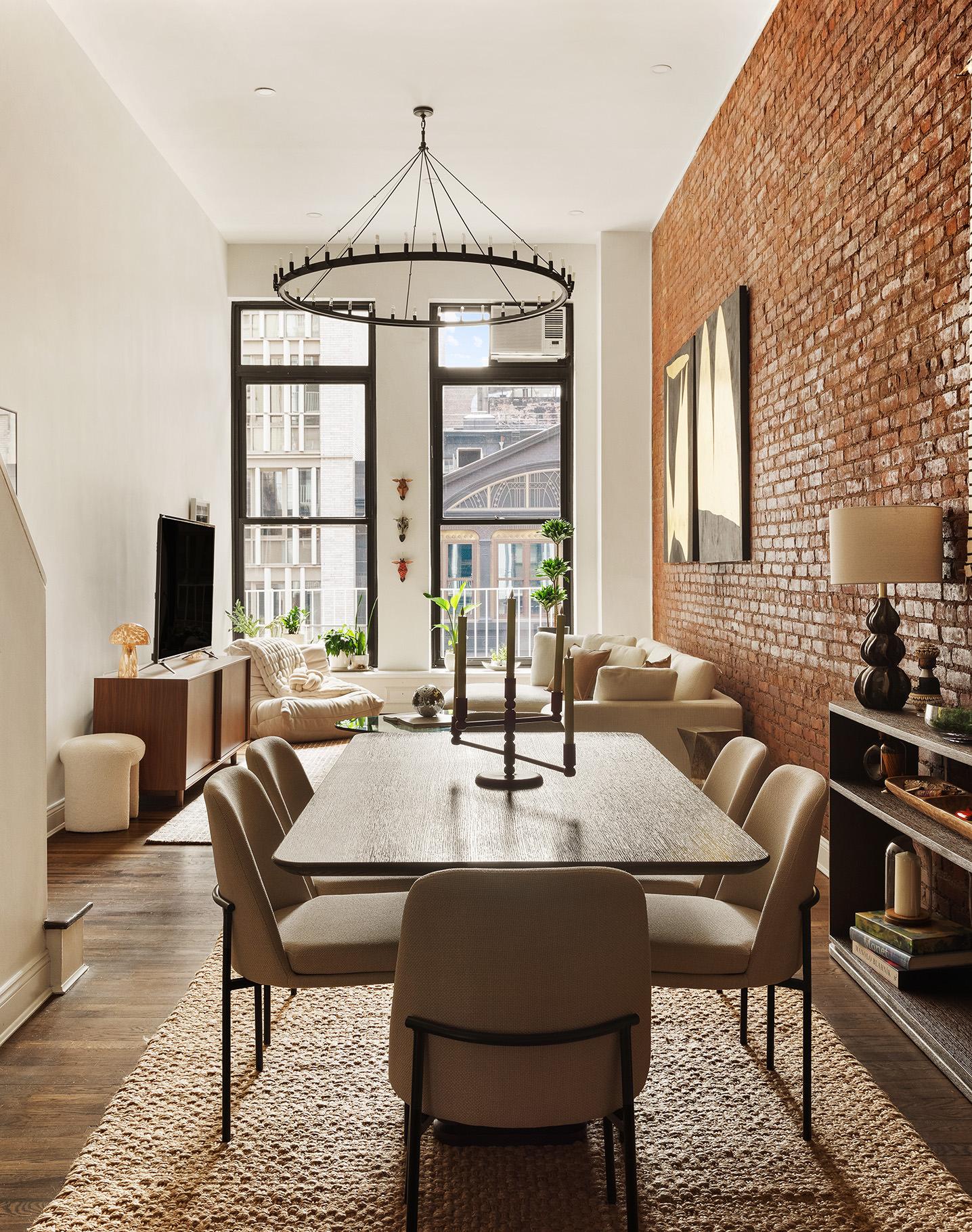 250 Mercer Street, Unit C302 Manhattan, NY 10012 - Photo 3 of 24 a view of a dining room with furniture