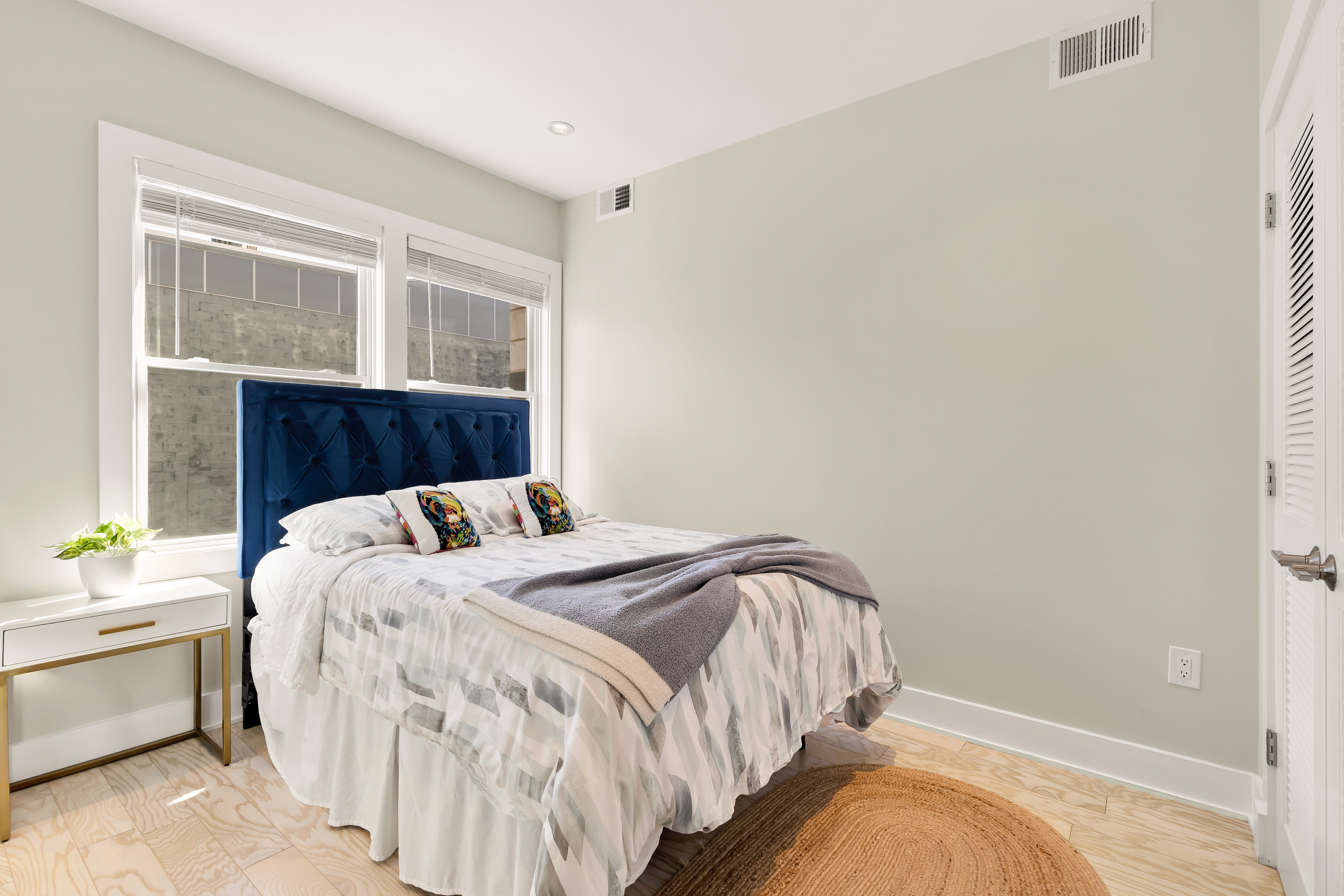2101 11th Street Northwest, Unit 403 Washington, DC 20001 - Photo 15 of 30 a bedroom with a bed and a window