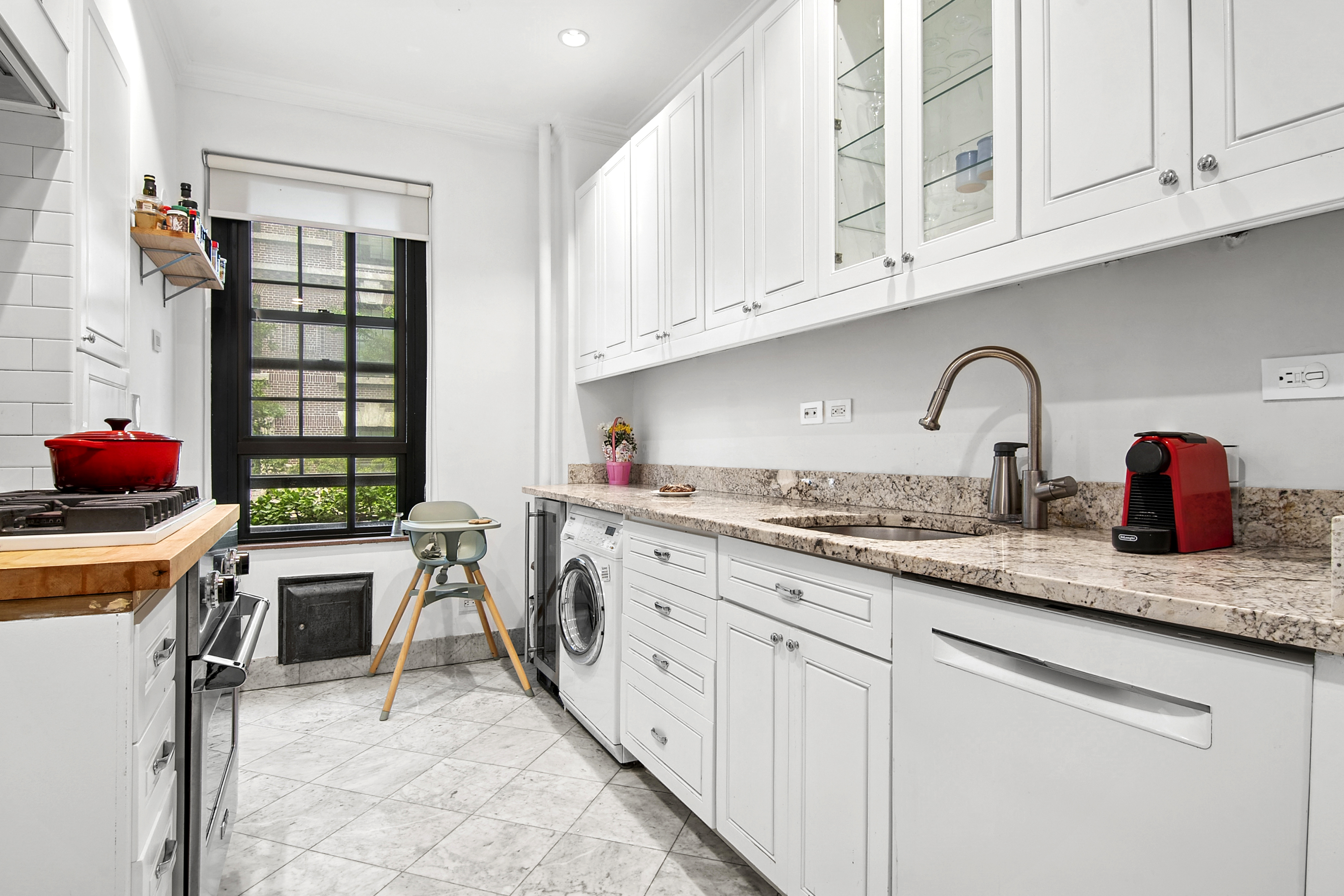 205 Hicks Street, Unit 2B Brooklyn, NY 11201 - Photo 6 of 8 a kitchen with stainless steel appliances granite countertop a sink and cabinets