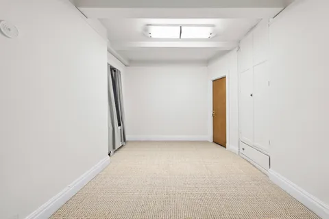 a view of a room with an empty space