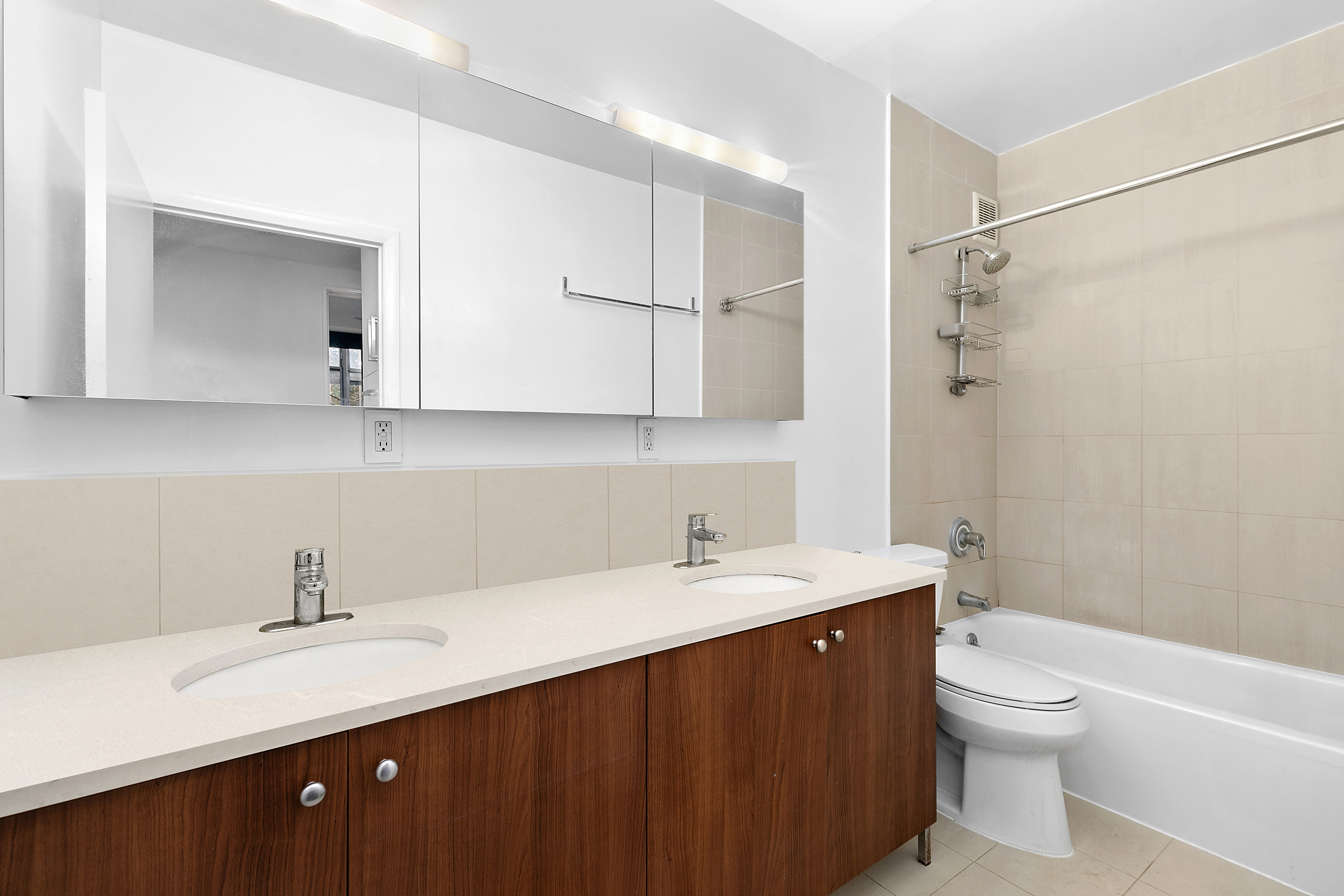 505 Court Street, Unit 3D Brooklyn, NY 11231 - Photo 8 of 14 a bathroom with a double vanity sink toilet and shower