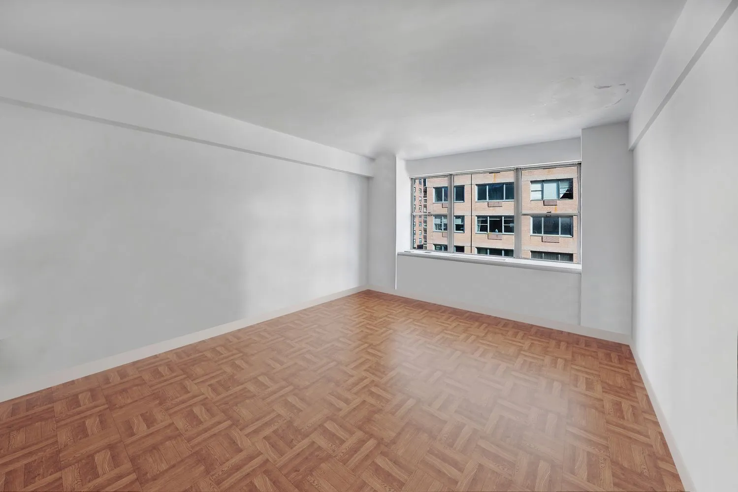 a view of an empty room with window
