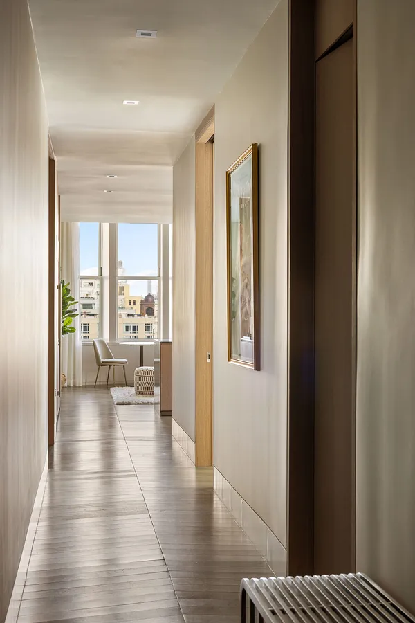 a view of a living room with a large window