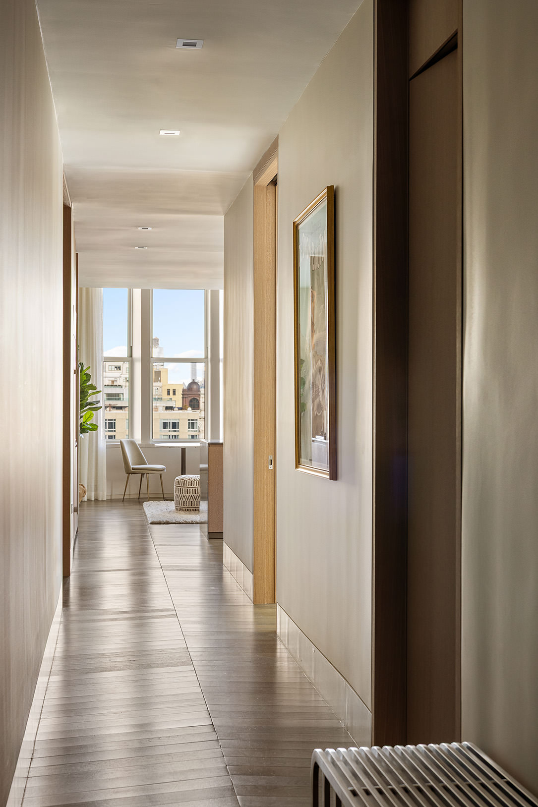 49 Chambers Street, Unit 17H Manhattan, NY 10007 - Photo 6 of 25 a view of a living room with a large window