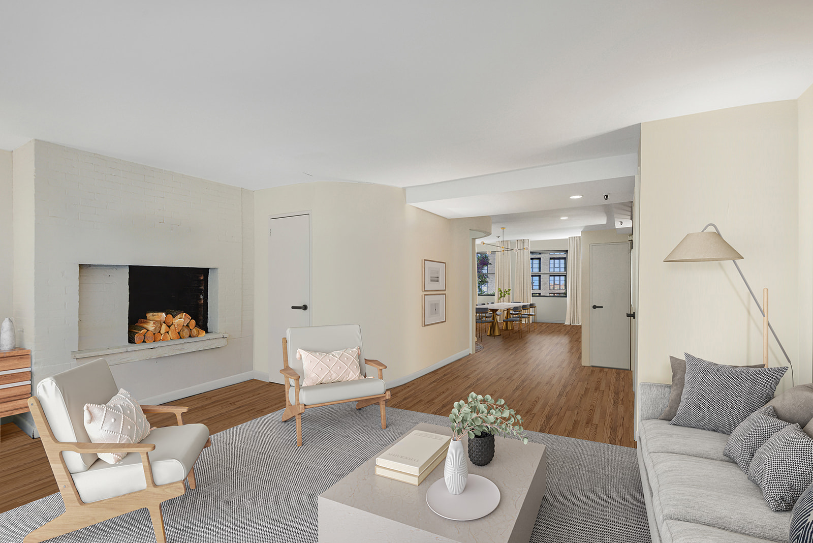 217 West 15th Street Manhattan, NY 10011 - Photo 6 of 21 a living room with furniture and a wooden floor