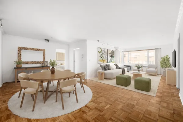 a living room with fireplace furniture and a large window