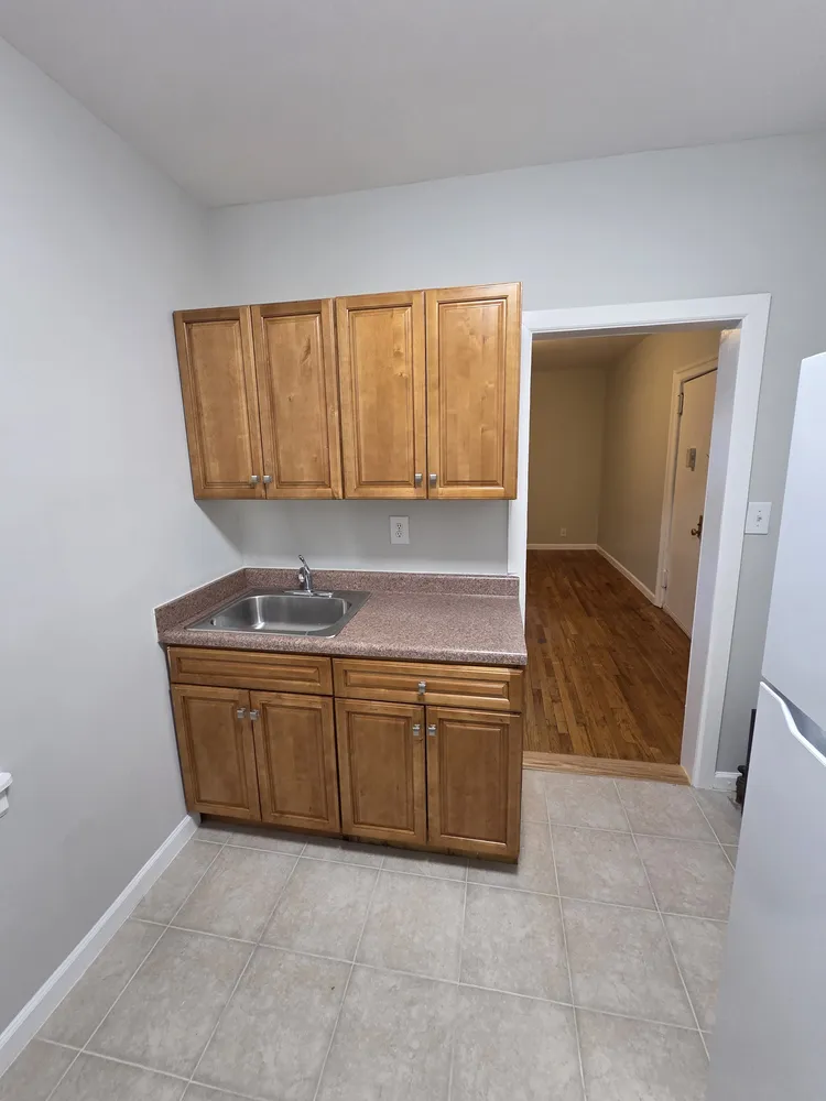 a room with granite countertop furniture and a sink