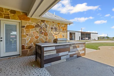 a view of an ocean house with a big yard