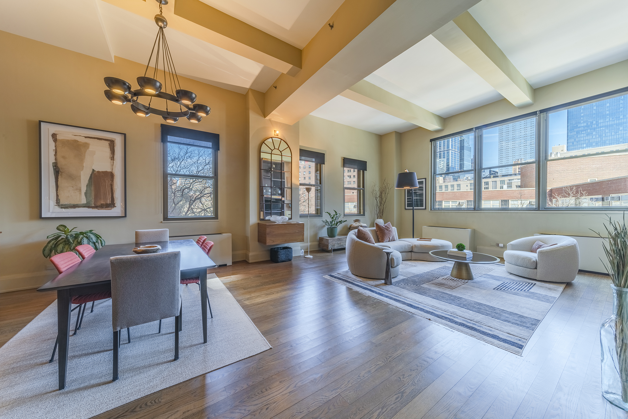 263 9th Avenue, Unit 3E Manhattan, NY 10001 - Photo 2 of 17 a living room with fireplace furniture and a wooden floor
