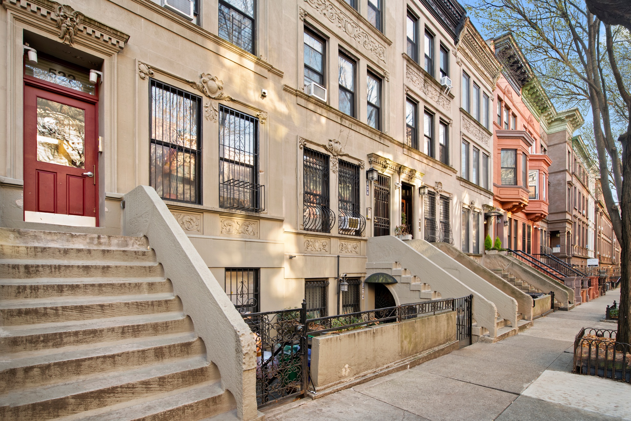 522 West 149th Street, Unit 3 Manhattan, NY 10031 - Photo 6 of 7 a view of a building with many windows