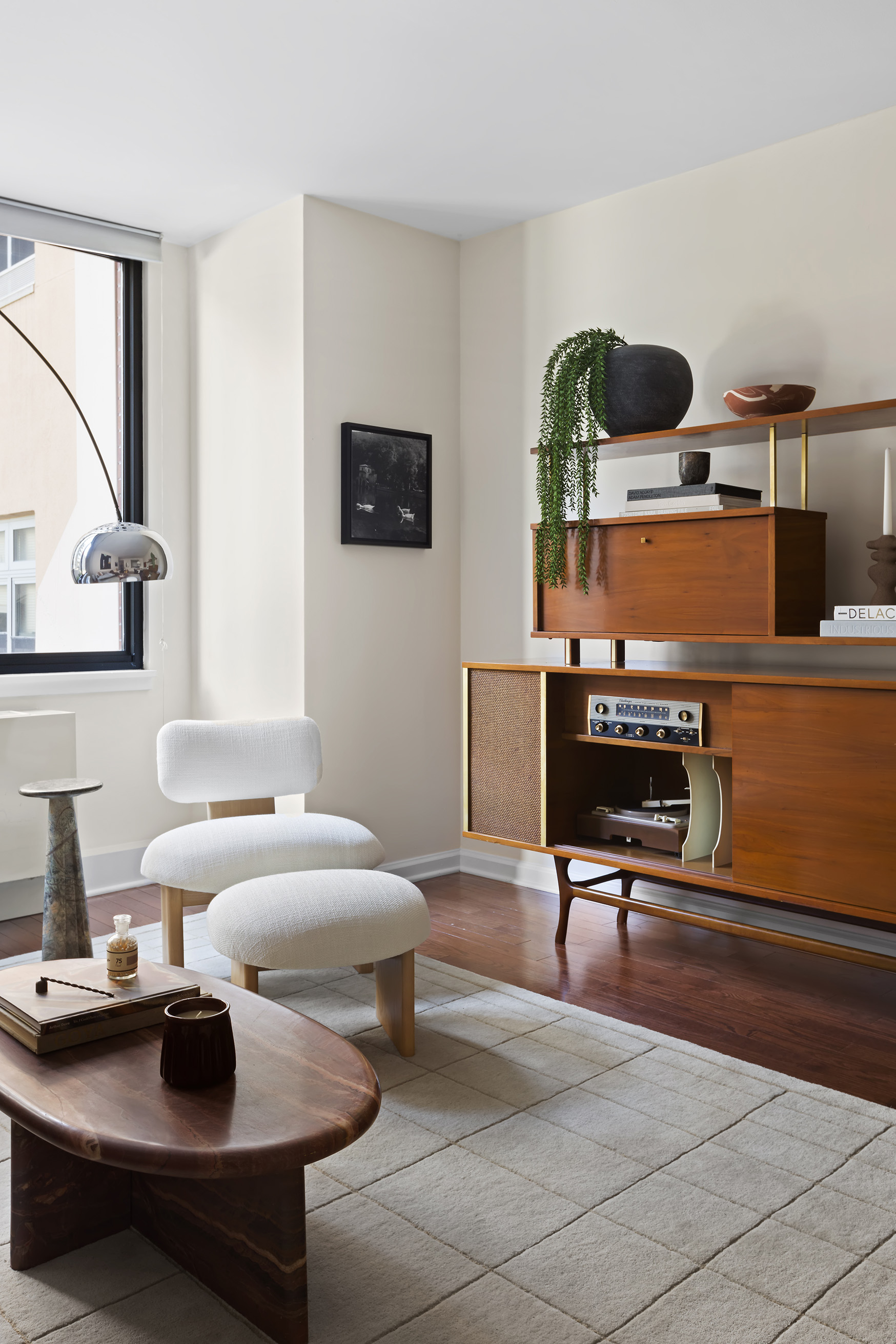 199 Bowery, Unit 3D Manhattan, NY 10002 - Photo 6 of 12 a living room with furniture and a lamp