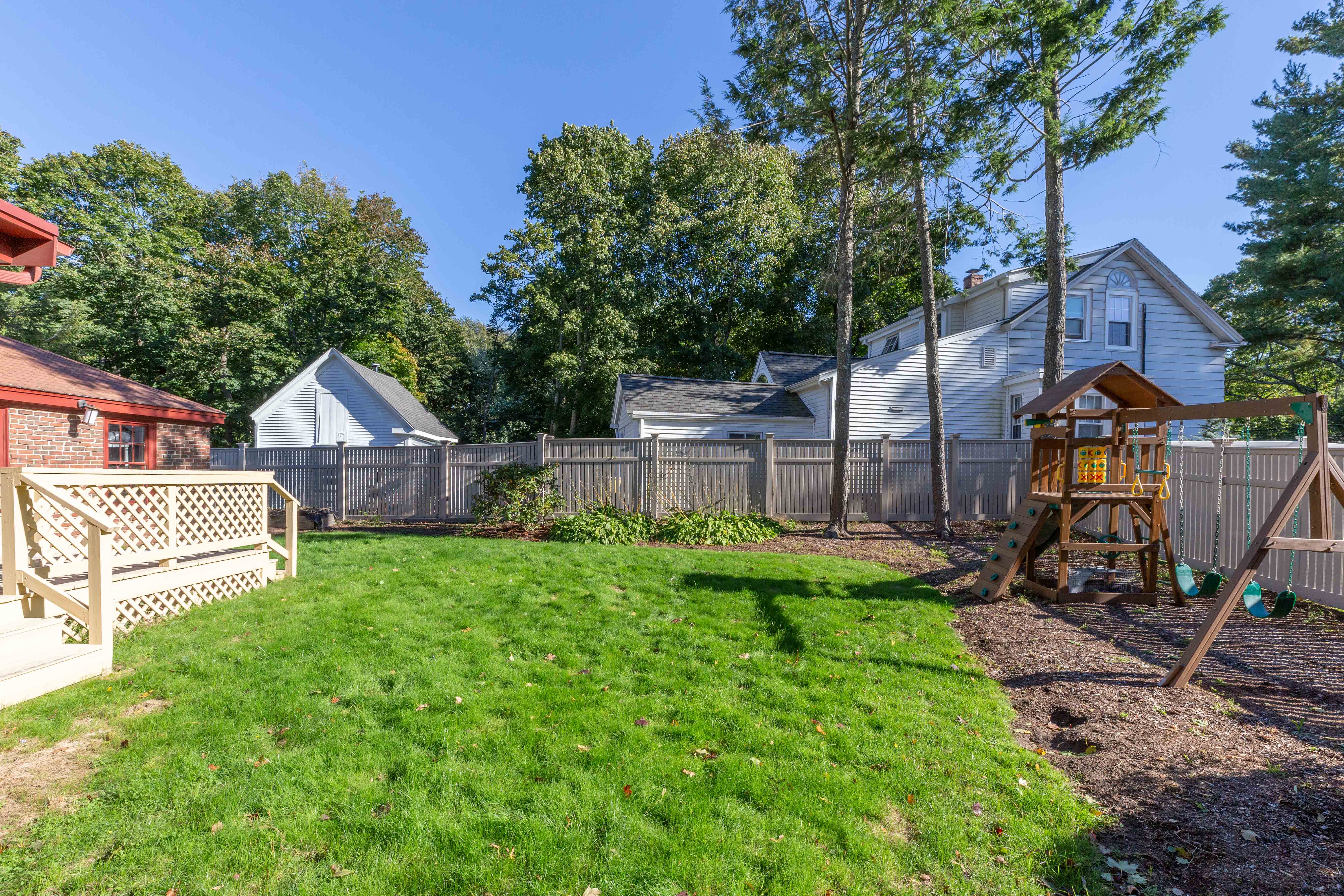 290 Dorset Road Waban, MA 02468 - Photo 21 of 23 a view of a house with backyard and a tree