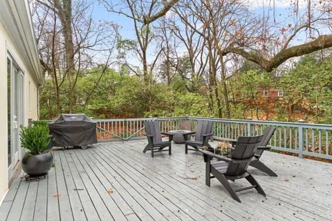 a view of balcony with furniture