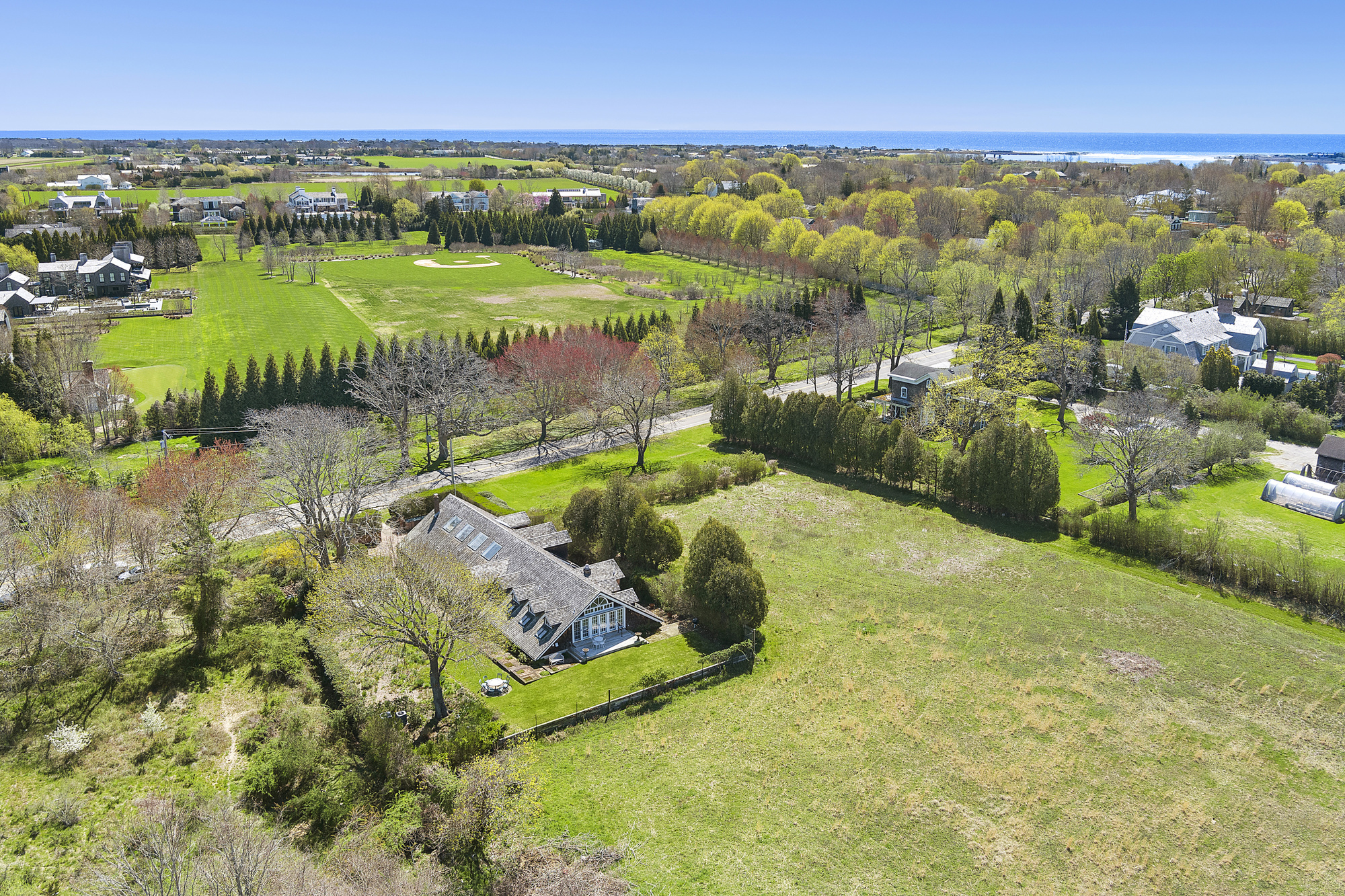 488 Ocean Road Bridgehampton, NY 11932 - Photo 19 of 21 a view of a lake with a city