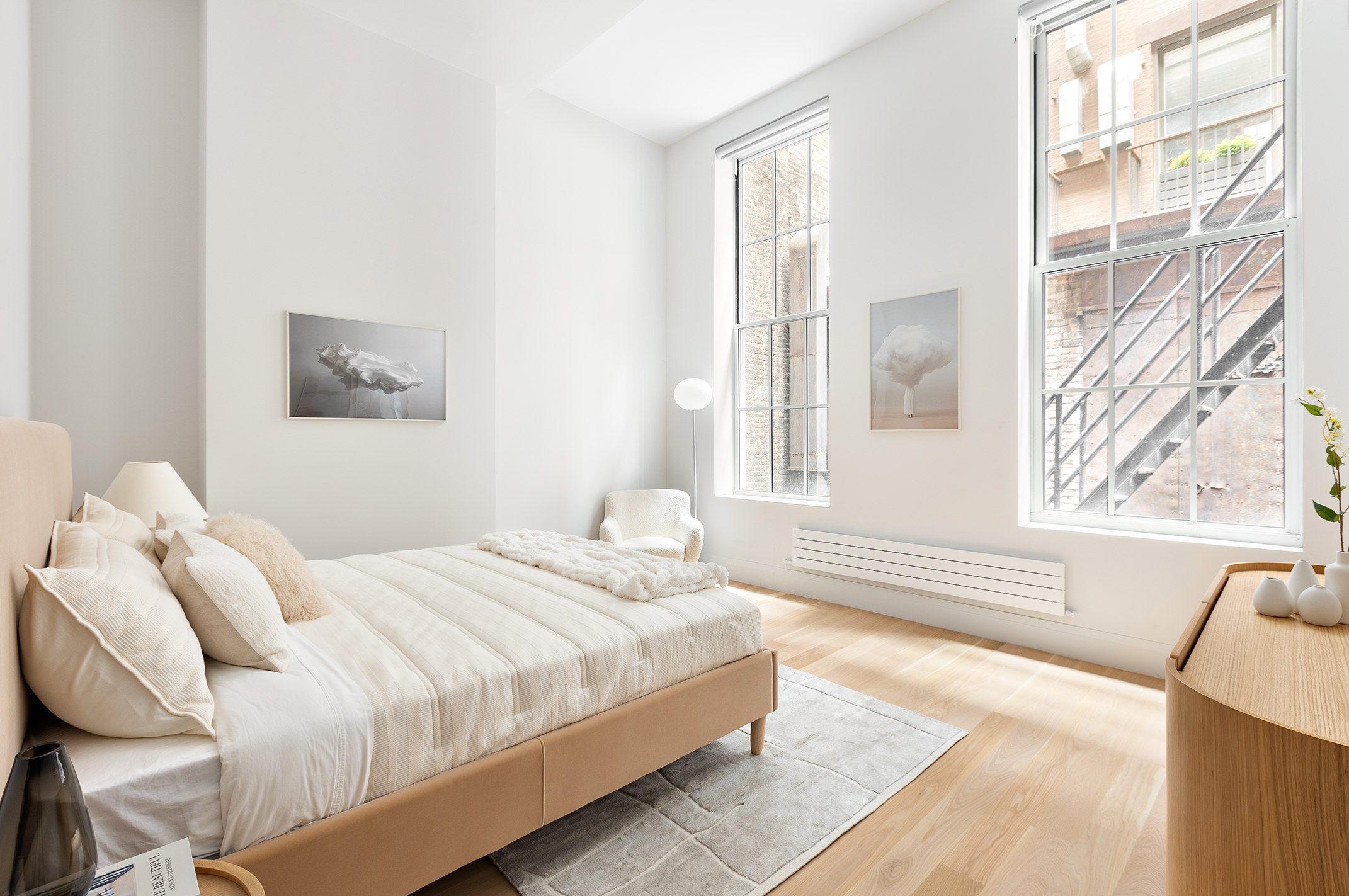 66 Reade Street, Unit TH Manhattan, NY 10007 - Photo 6 of 18 a bedroom with a bed and wooden floor