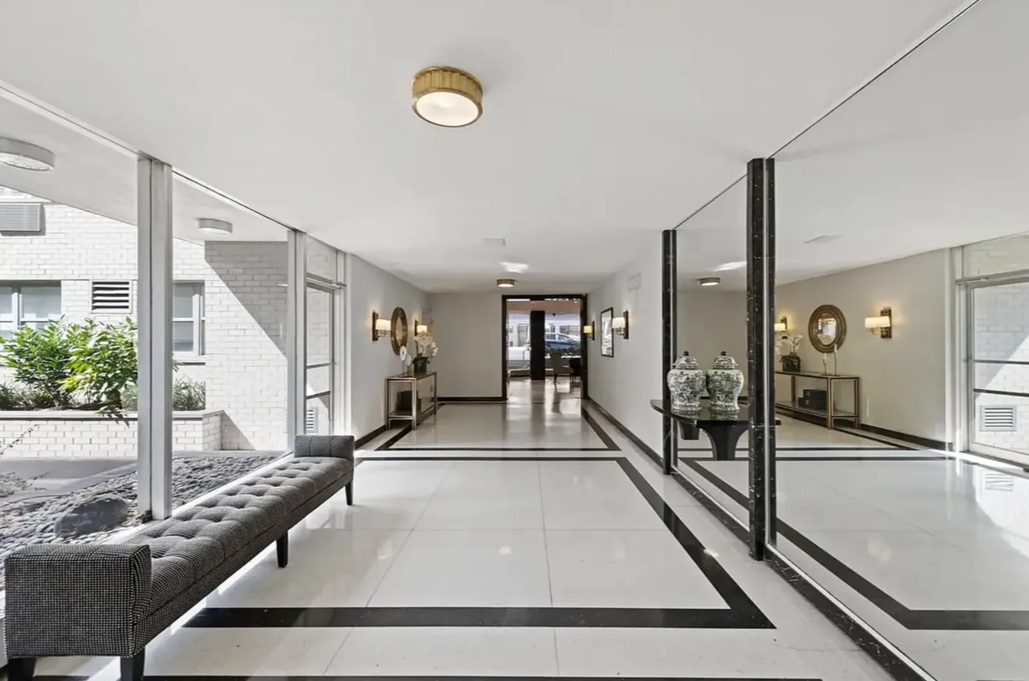 a view of a living room and entryway