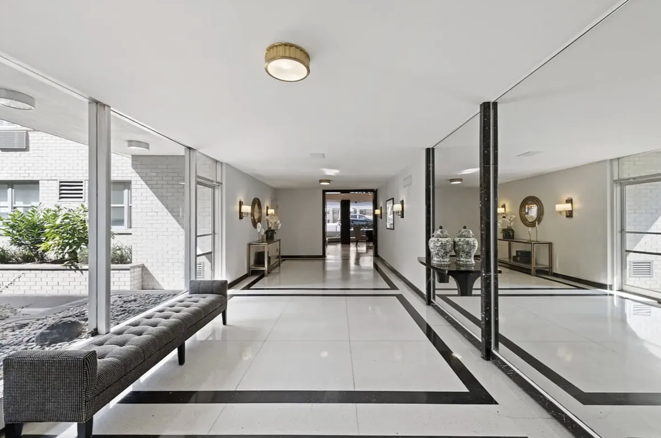 35 Sutton Place, Unit 10F Manhattan, NY 10022 - Photo 8 of 11 a view of a living room and entryway
