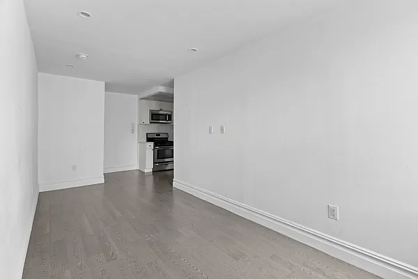 20 Avenue A, Unit 3AB Manhattan, NY 10009 - Photo 10 of 13 wooden floor in a room