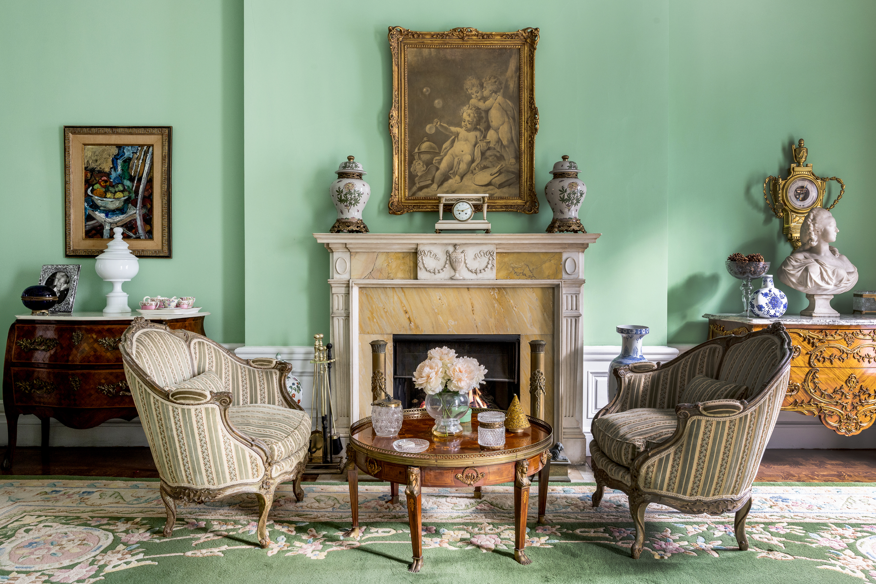 21 East 81st Street Manhattan, NY 10028 - Photo 5 of 21 a living room with furniture and a fireplace