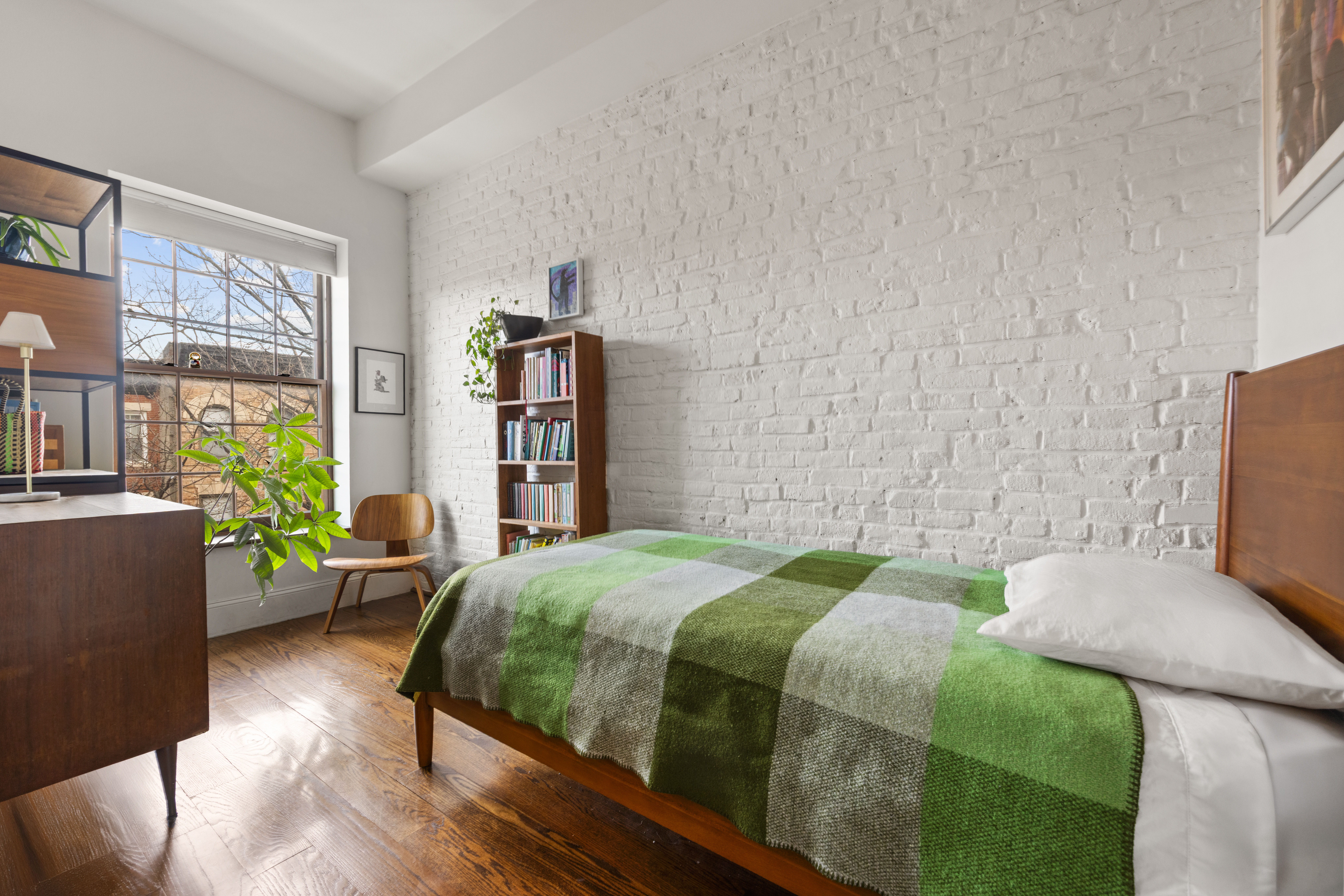 118 President Street, Unit 4 Brooklyn, NY 11231 - Photo 7 of 16 a bedroom with a bed and a couch