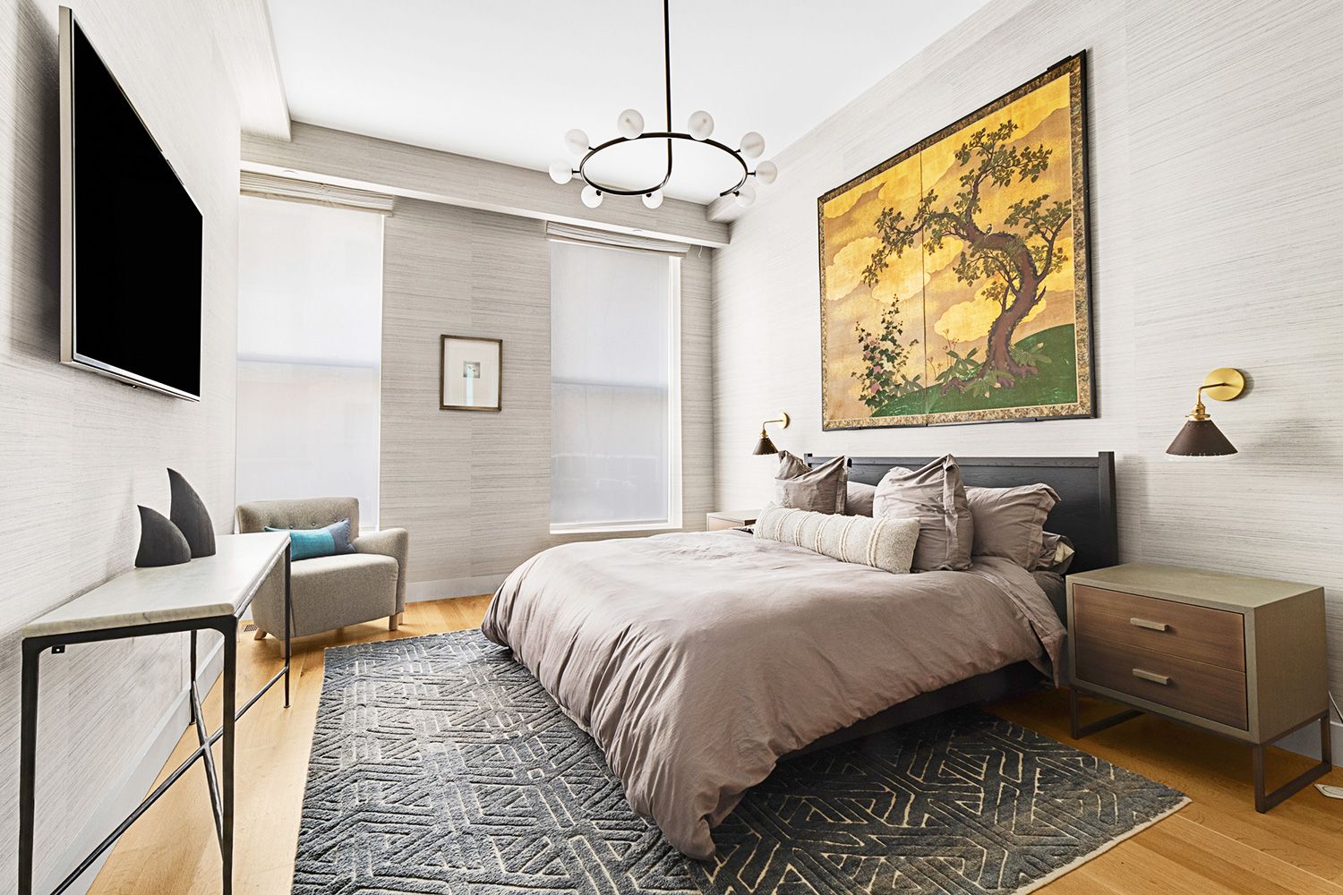 a bedroom with double bed and a flat screen tv