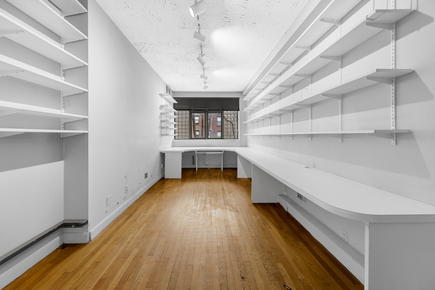 219 East 49th Street Manhattan, NY 10017 - Photo 12 of 19 a view of entryway and hall with wooden floor