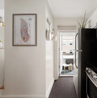 a view of a bedroom from a hallway