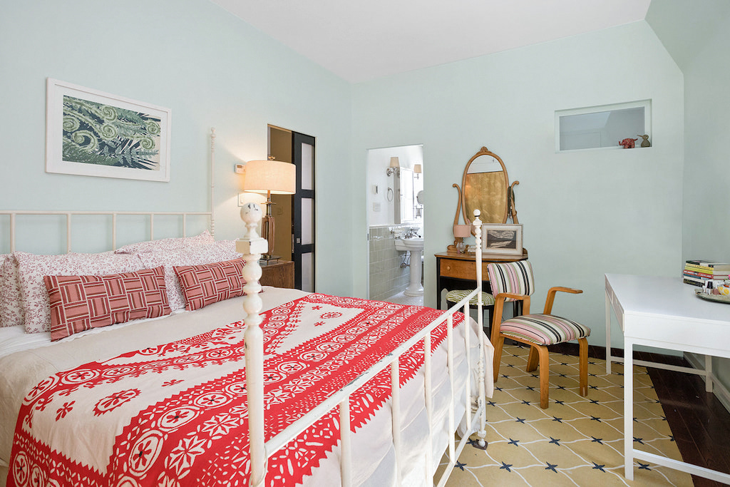 315 Washington Avenue Brooklyn, NY 11205 - Photo 20 of 38 a bedroom with a bed and wooden floor