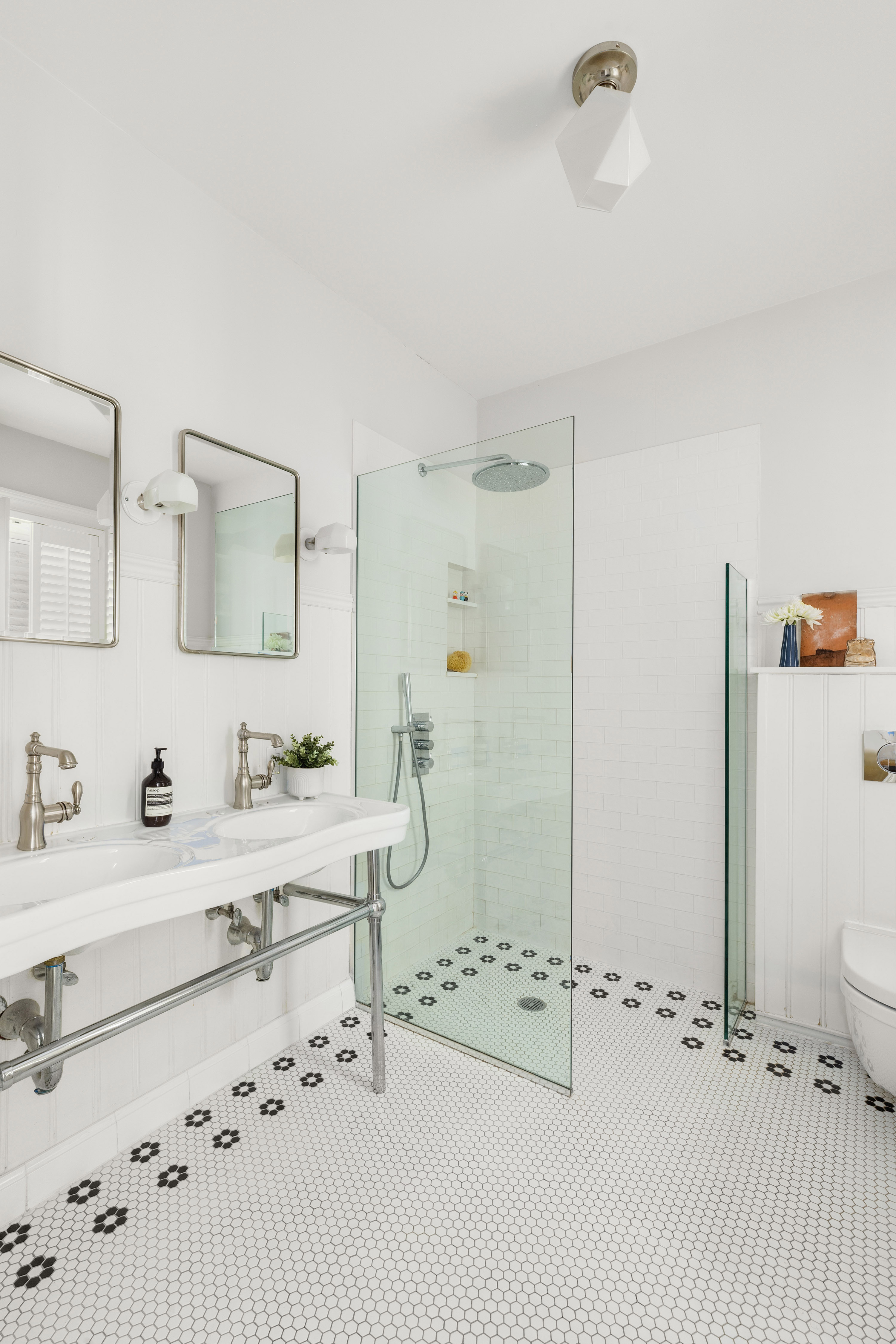 144 Garfield Place, Unit 2R Brooklyn, NY 11215 - Photo 7 of 12 a bathroom with a sink vanity granite tub and shower