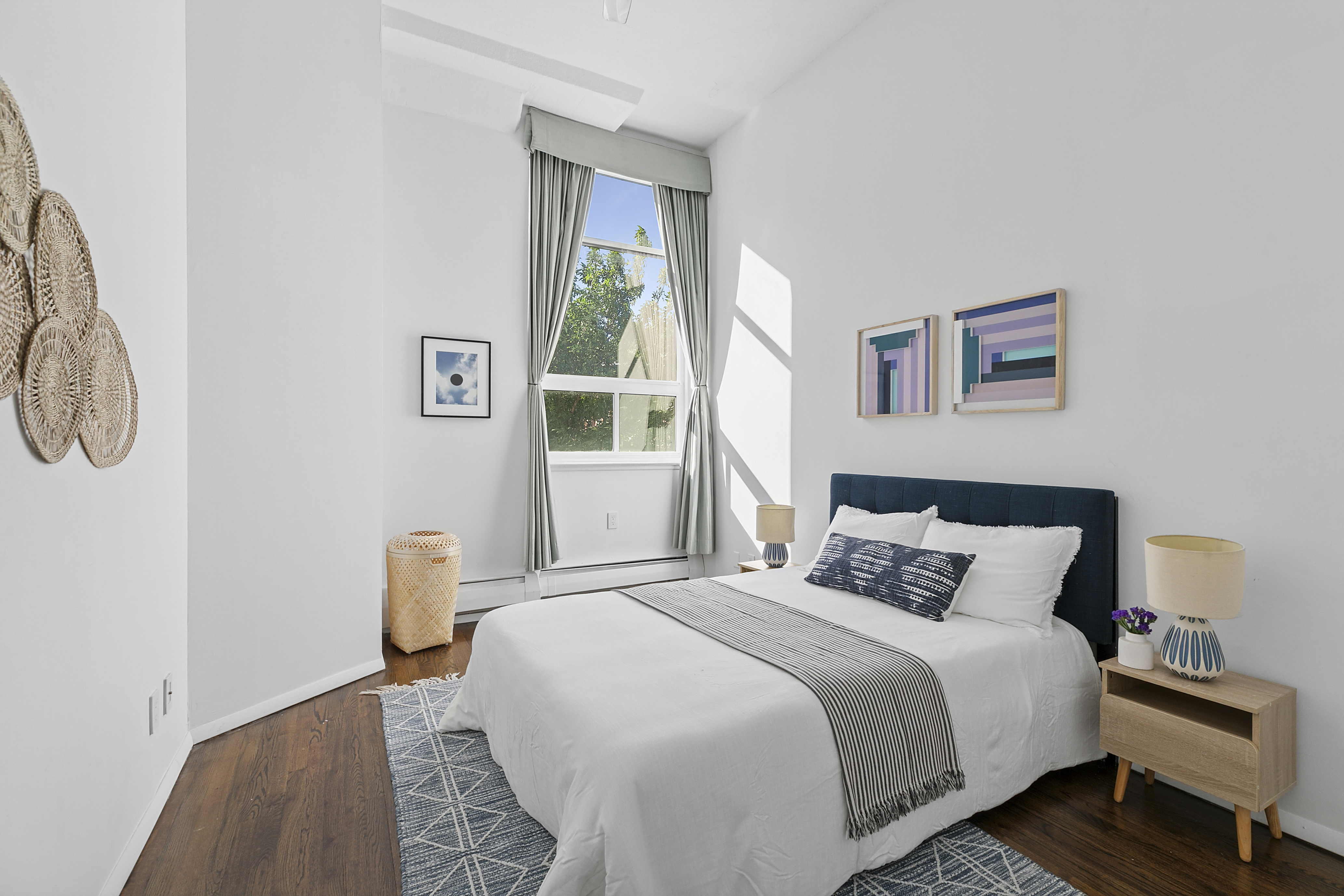 505 Court Street, Unit 3D Brooklyn, NY 11231 - Photo 5 of 14 a bedroom with a bed and a window