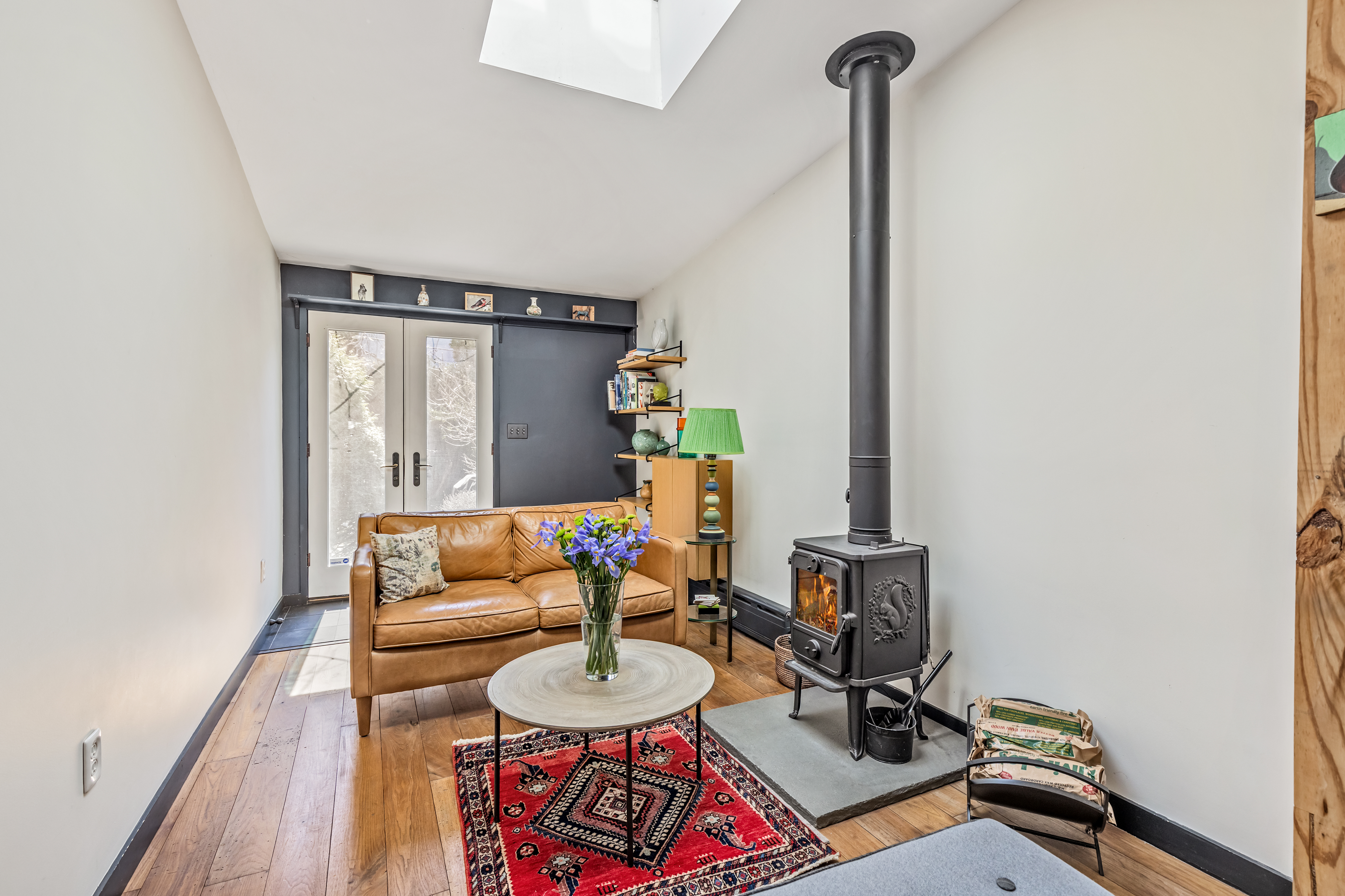162 10th Street Brooklyn, NY 11215 - Photo 4 of 13 a living room with furniture and wooden floor
