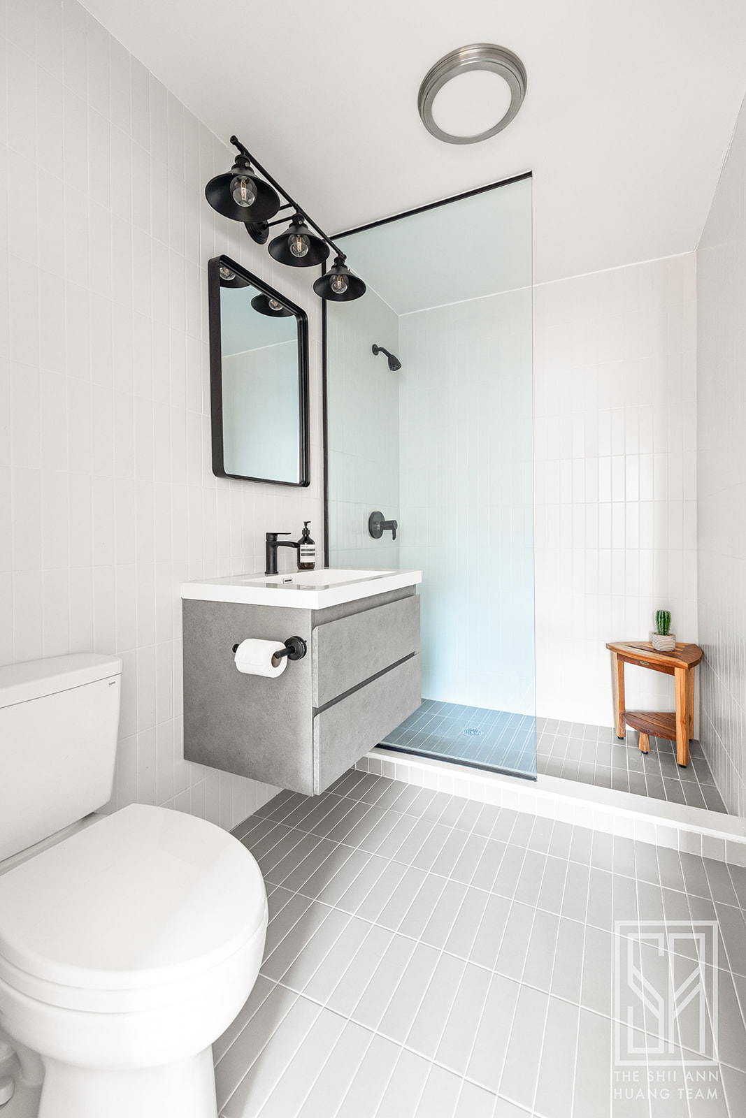 475 Washington Avenue, Unit 4I Brooklyn, NY 11238 - Photo 7 of 10 a bathroom with a sink mirror vanity and toilet